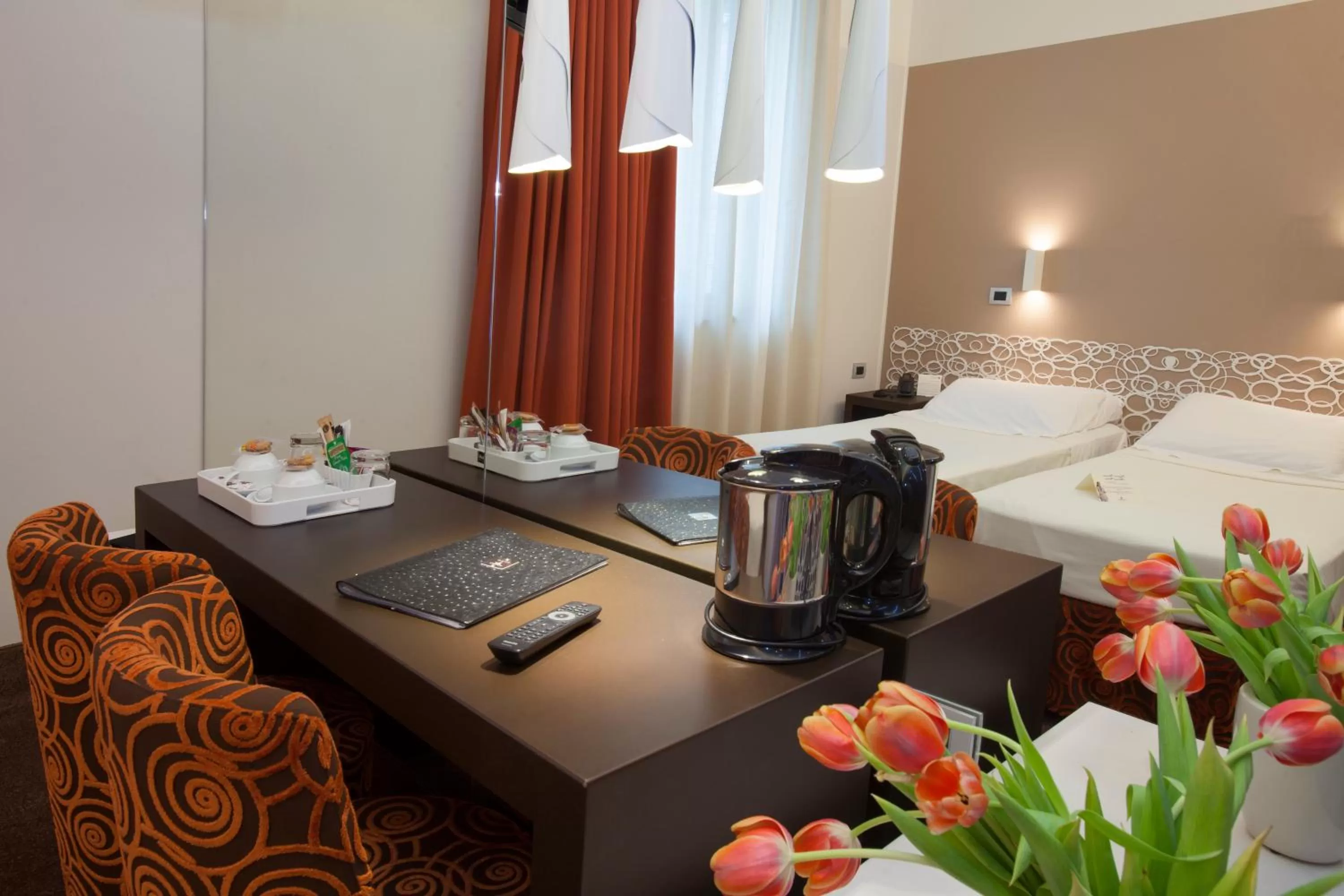 Seating area, Bed in Hotel Berna