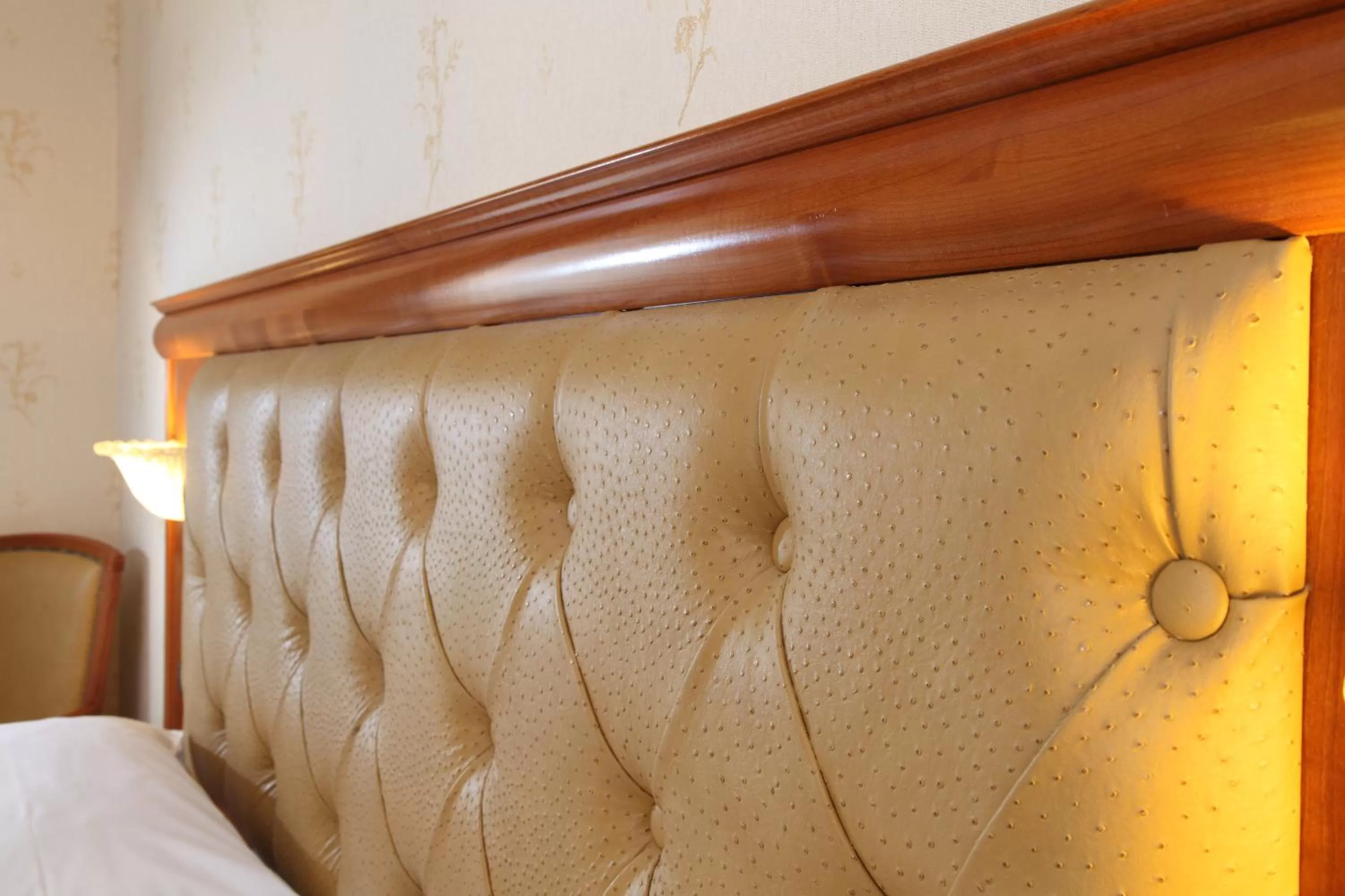 Decorative detail, Bed in Hotel Serena srl