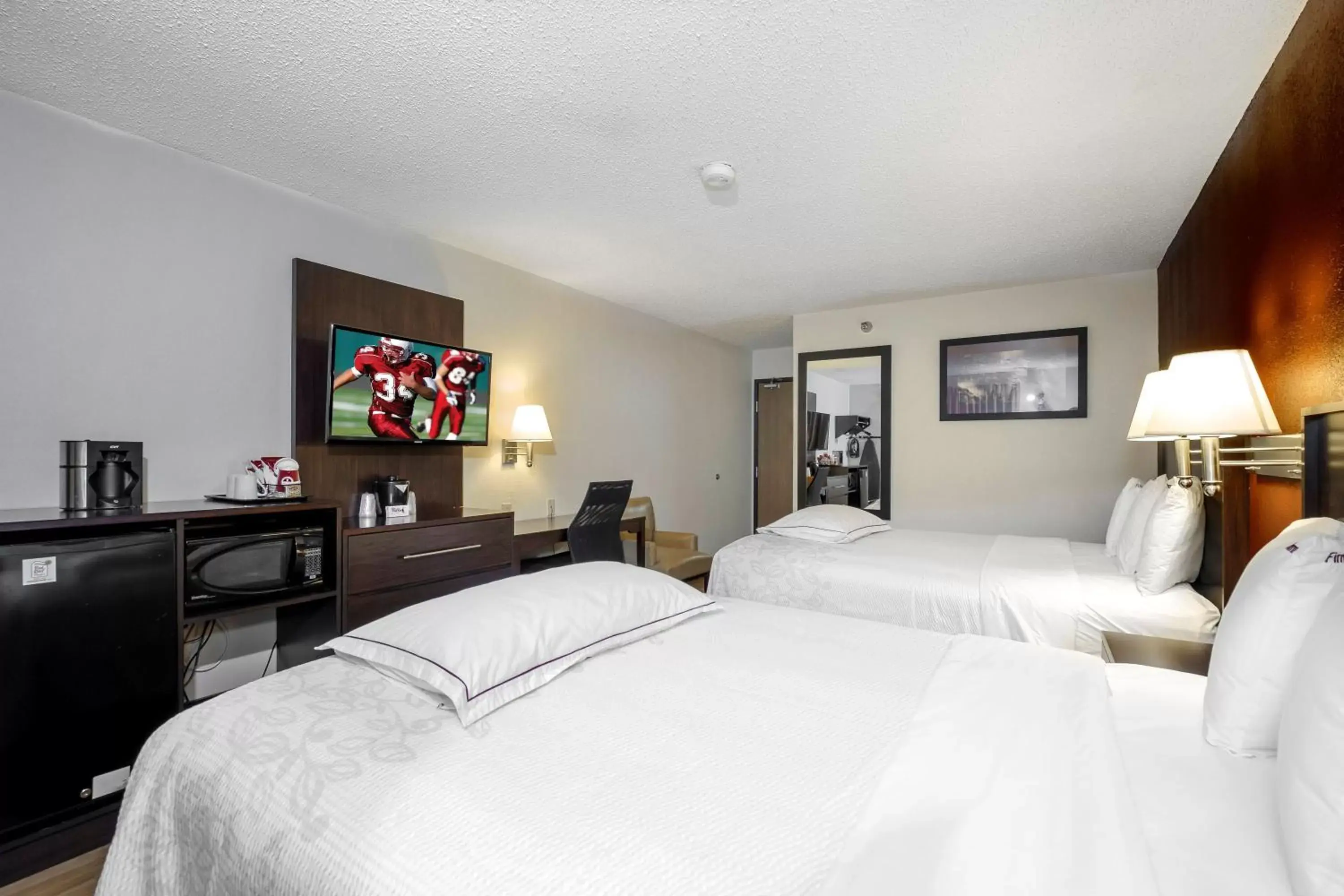 Premium Room with Two Queen Beds Smoke Free (Upgraded Bedding and Snack Box) in Red Roof Inn PLUS+ & Suites Malone Premium Room with Two Queen Beds Smoke Free (Upgraded Bedding and Snack Box) in Red Roof Inn PLUS+ & Suites Malone