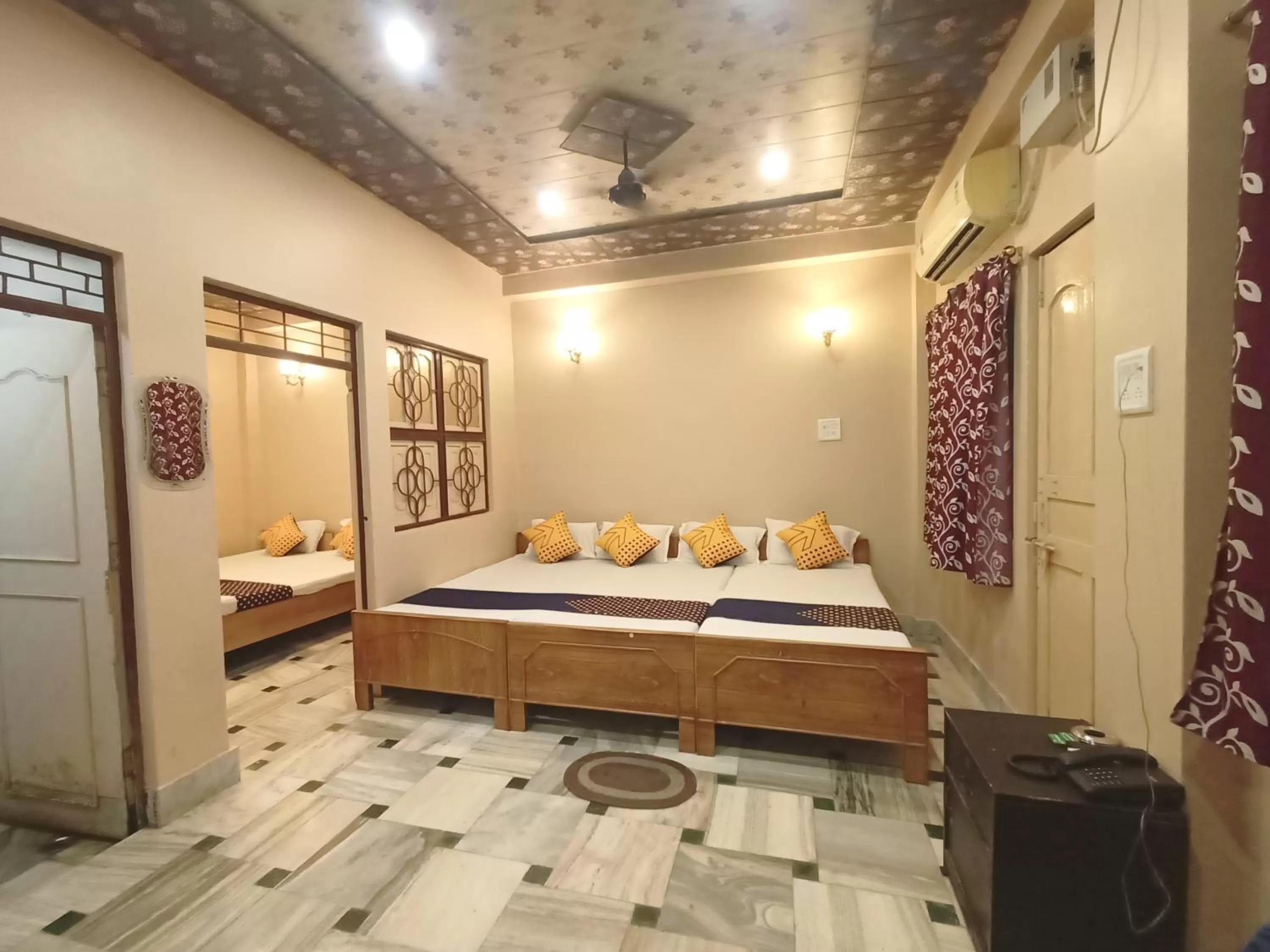 Photo of the whole room, Bed in Hotel Aakash Ganga