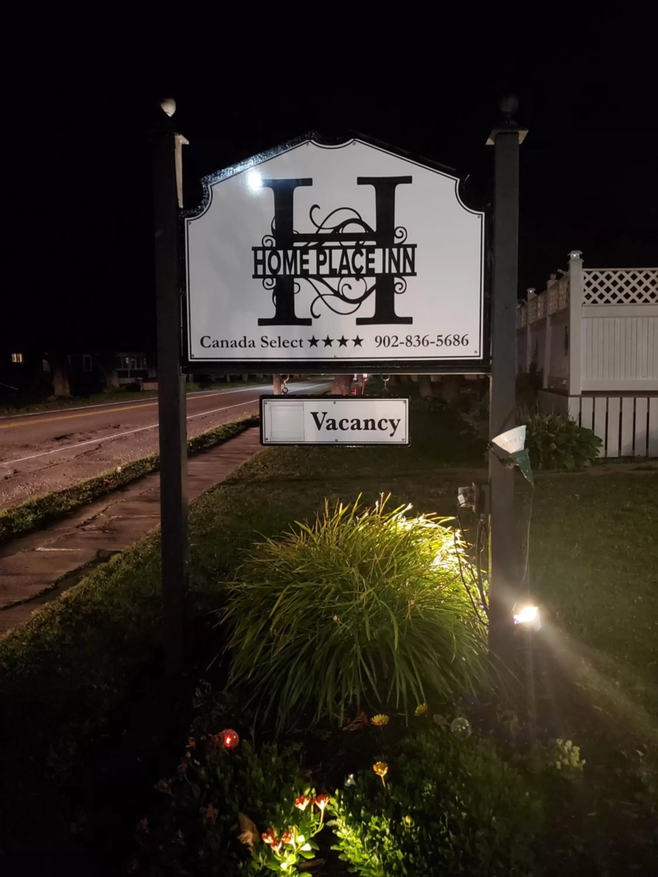 Property logo or sign in The Home Place Inn