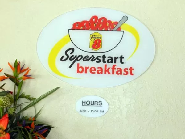 Property logo or sign in Super 8 by Wyndham Yucca Val/Joshua Tree Nat Pk Area