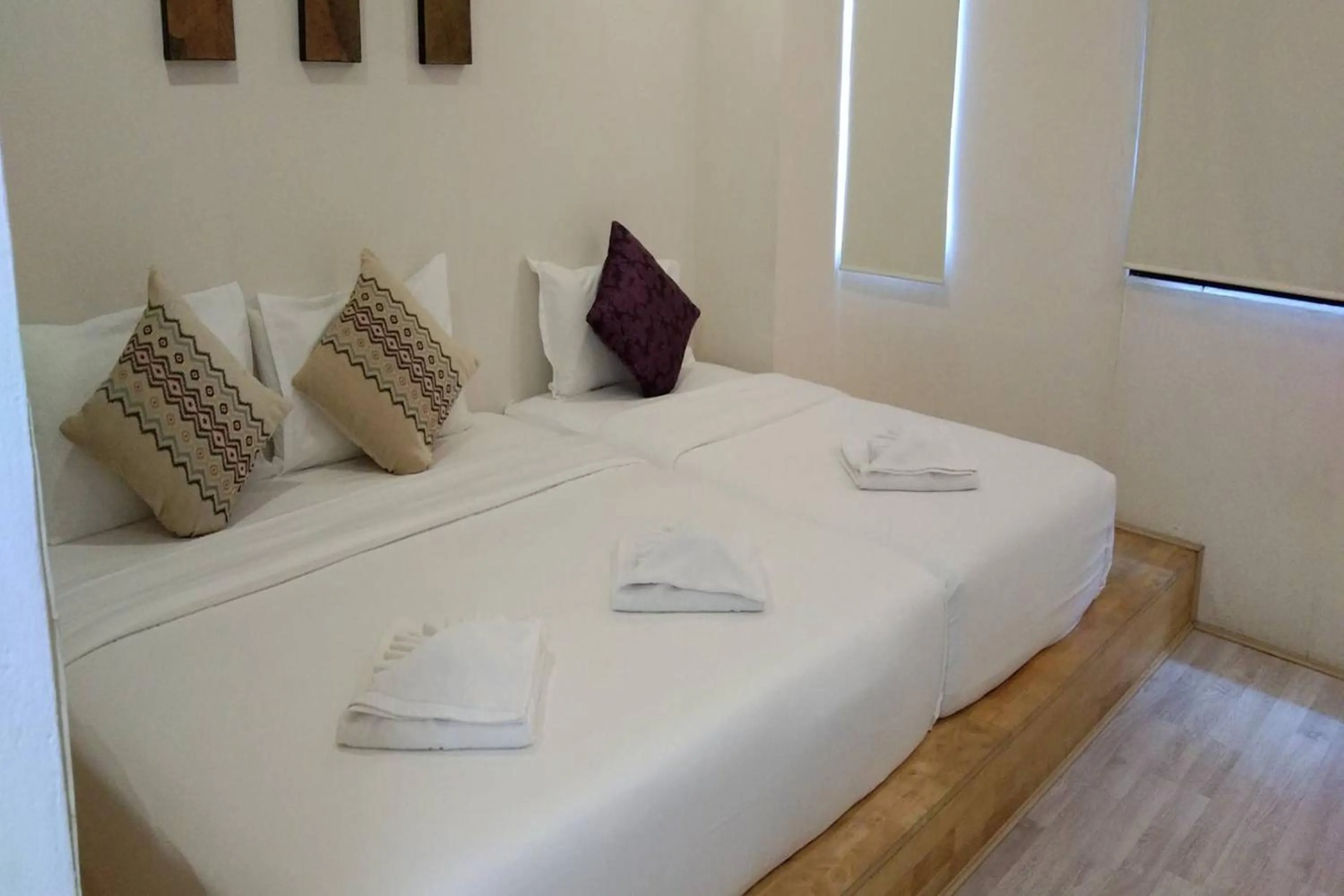 Bed in The Guest Arak Boutique Hotel