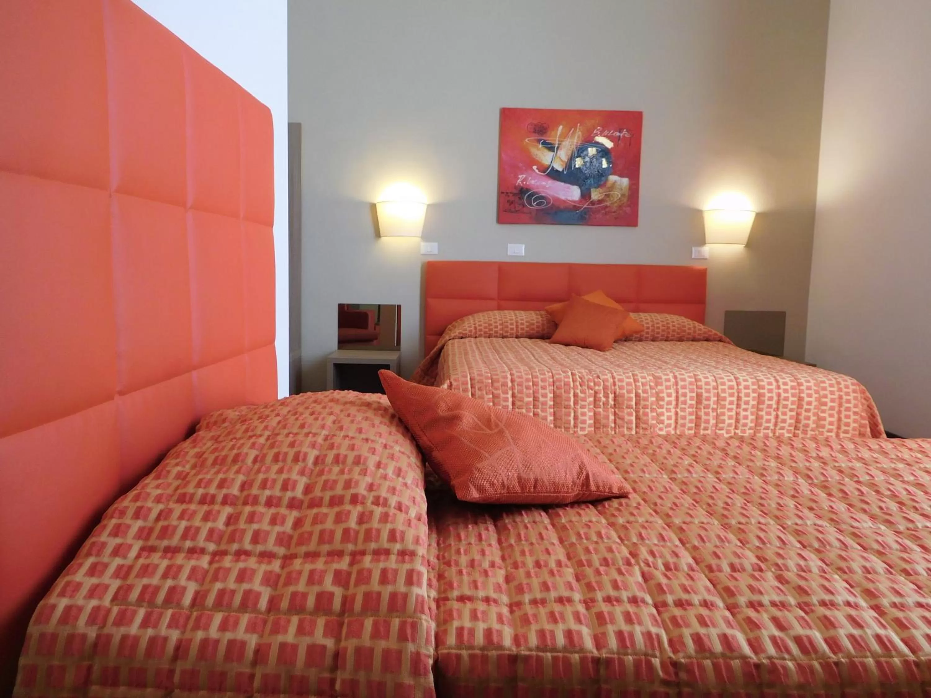 Bed in Moonlight Hotel&Suites