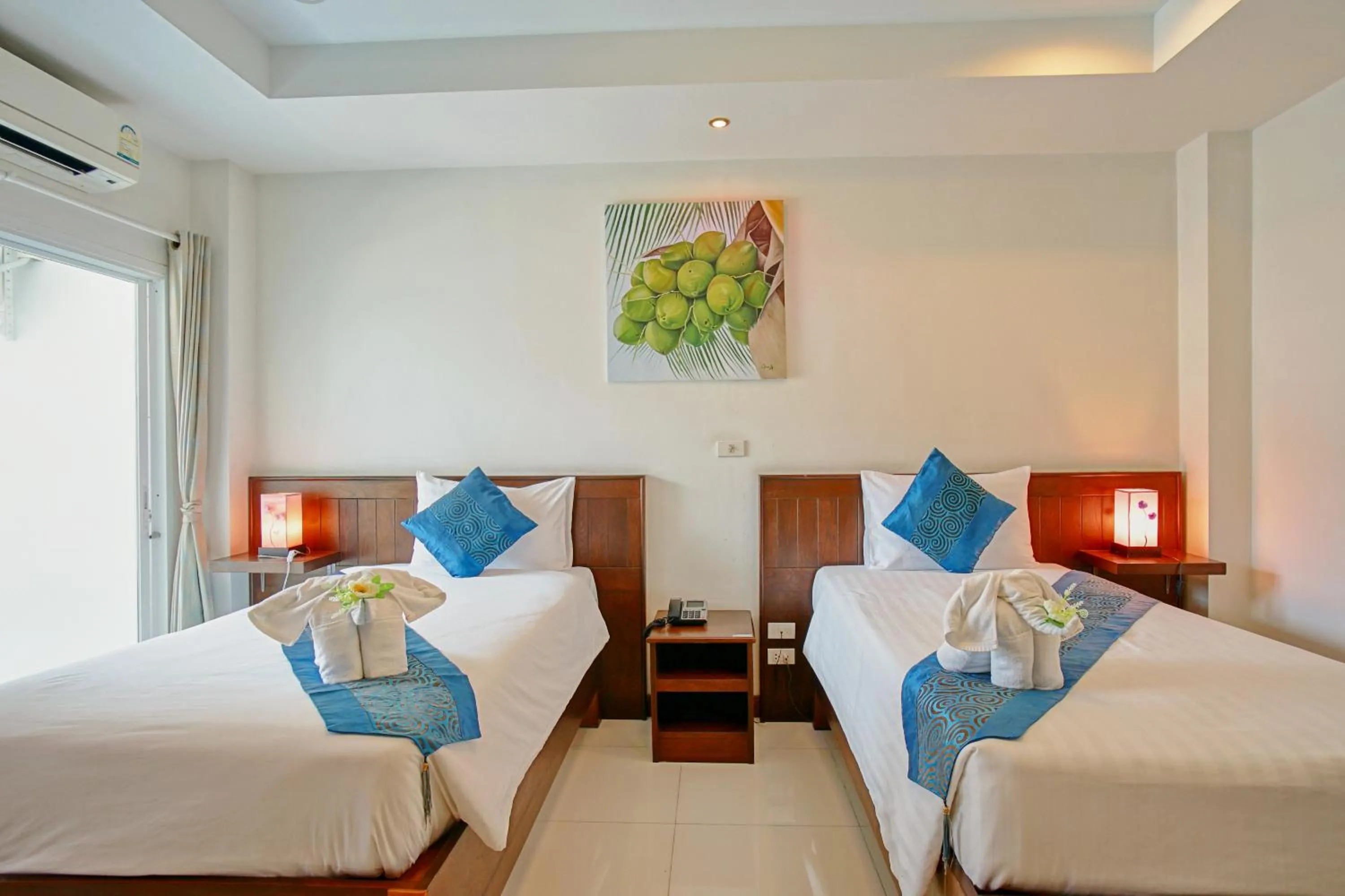 Bed in Ruen Buathong Boutique Hotel Patong Beach