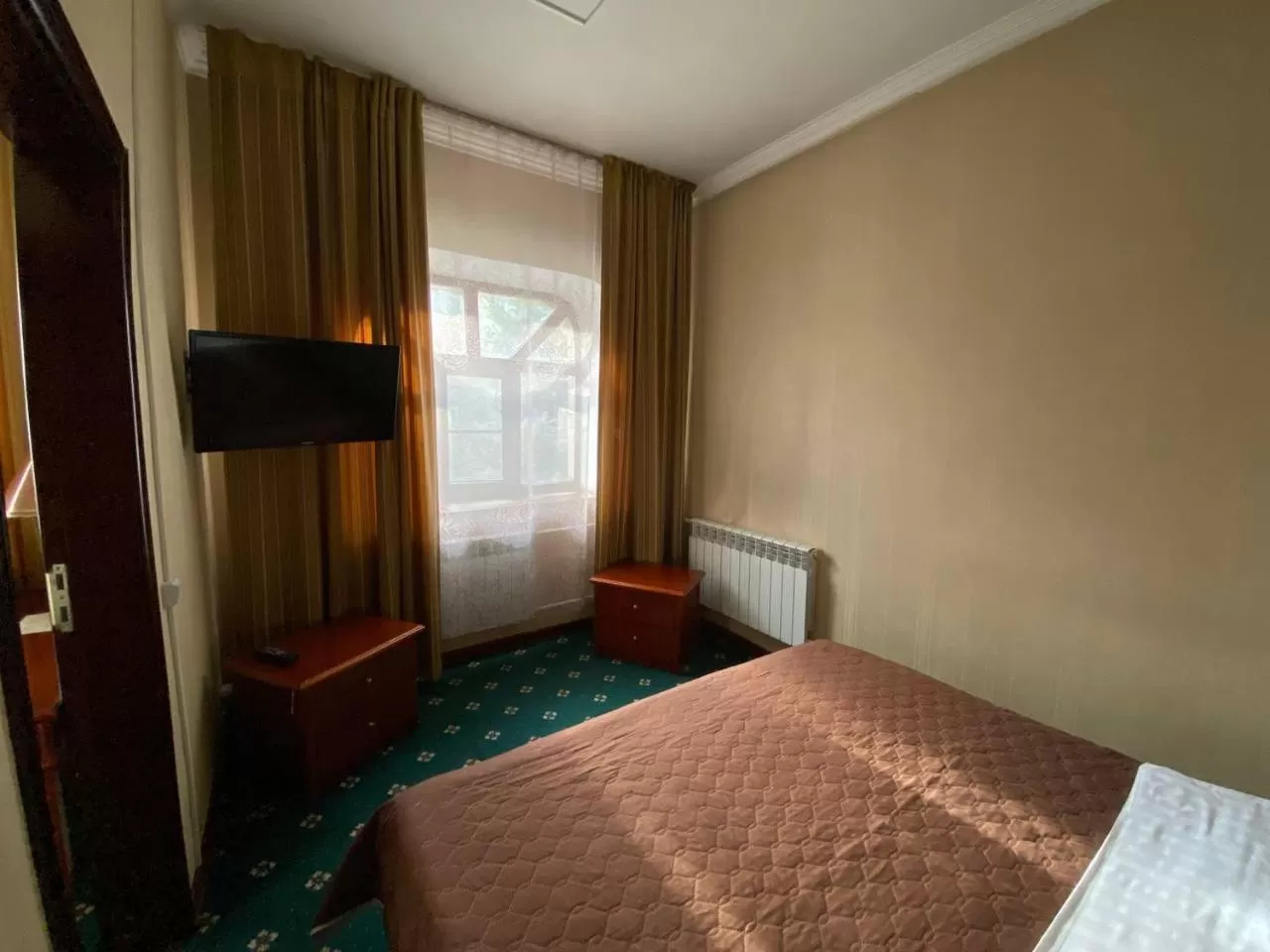 Bed in Deluxe SPA-Hotel