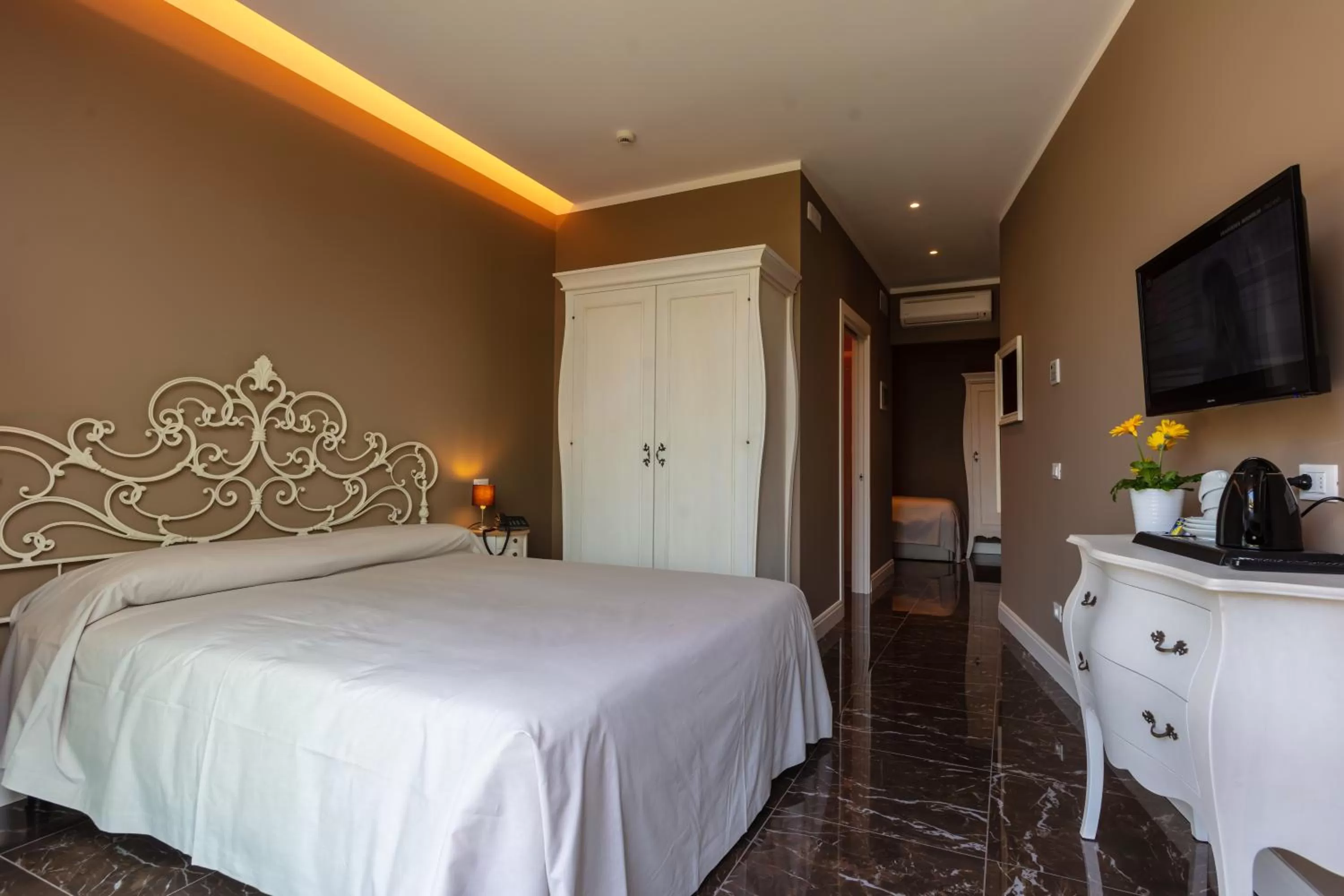 Bed in Art Hotel Ventaglio