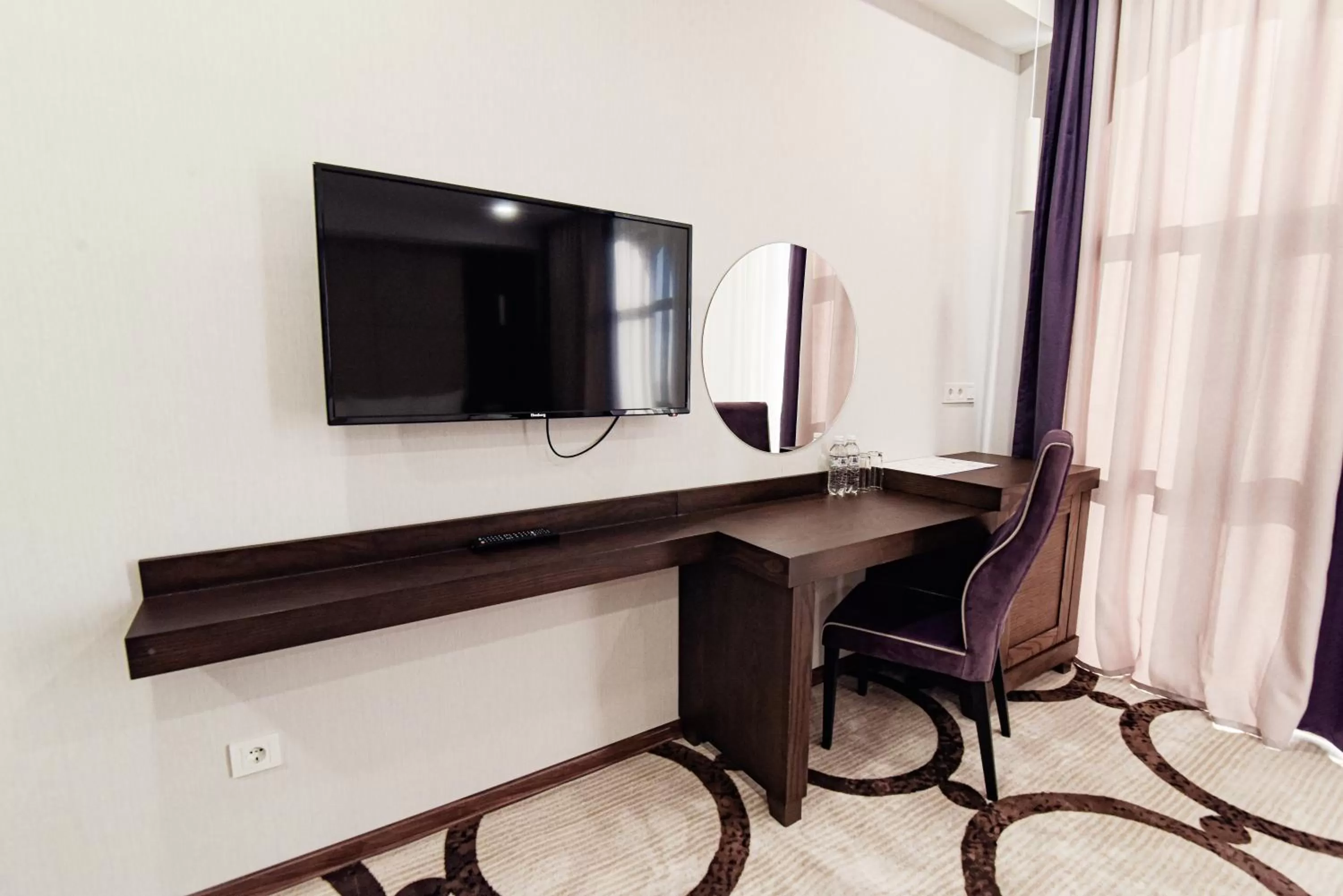 TV/Entertainment Center in East Palace Hotel