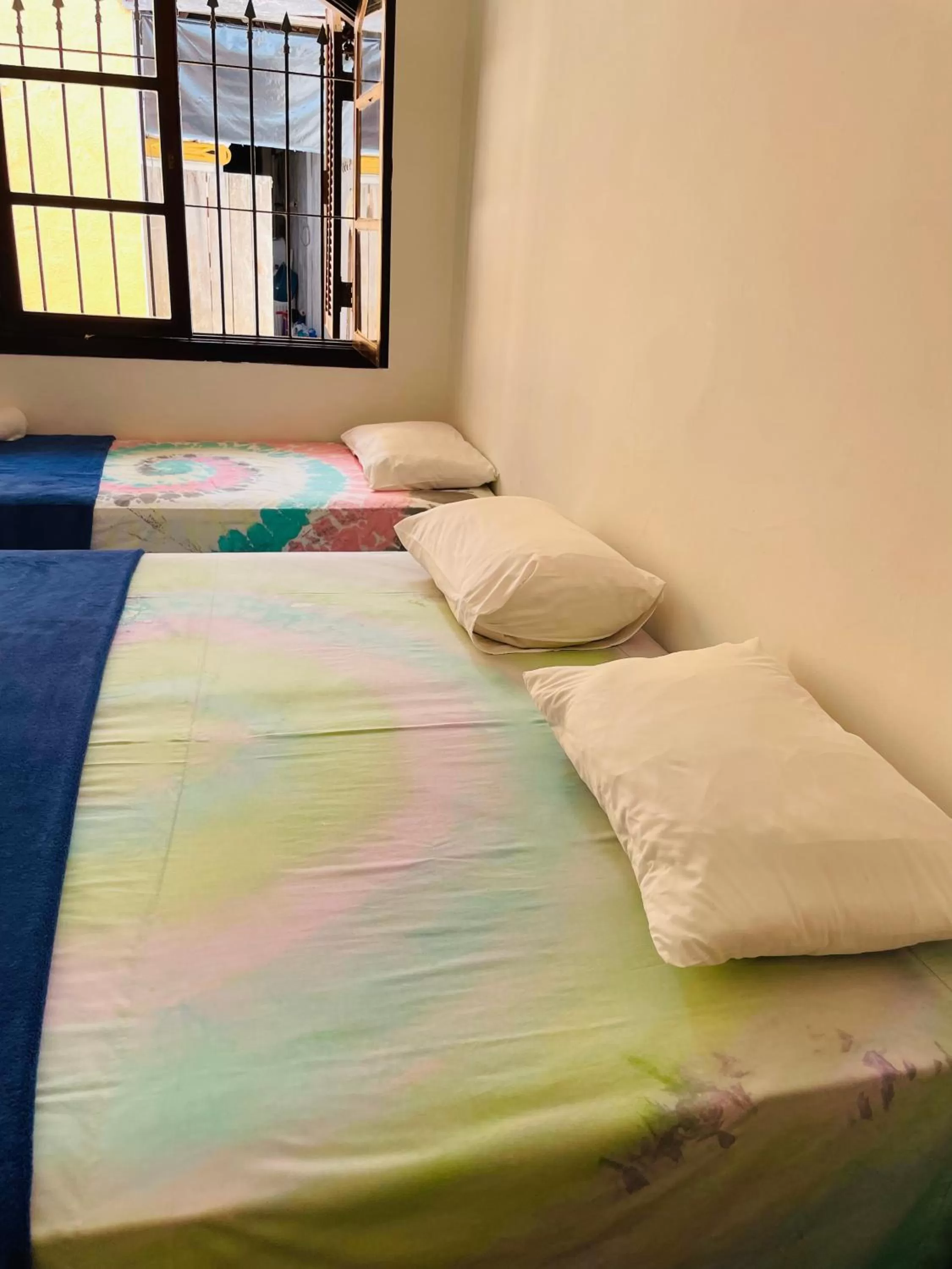 Bed in Pousada Praia do Tombo