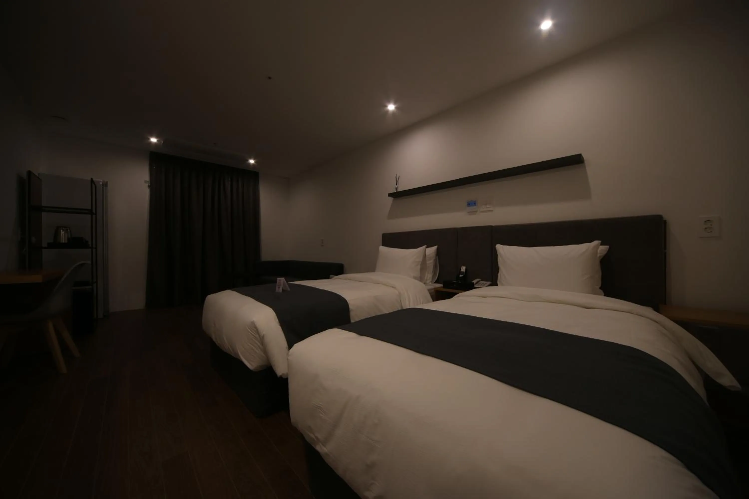 Bed in Hotel Noblestay