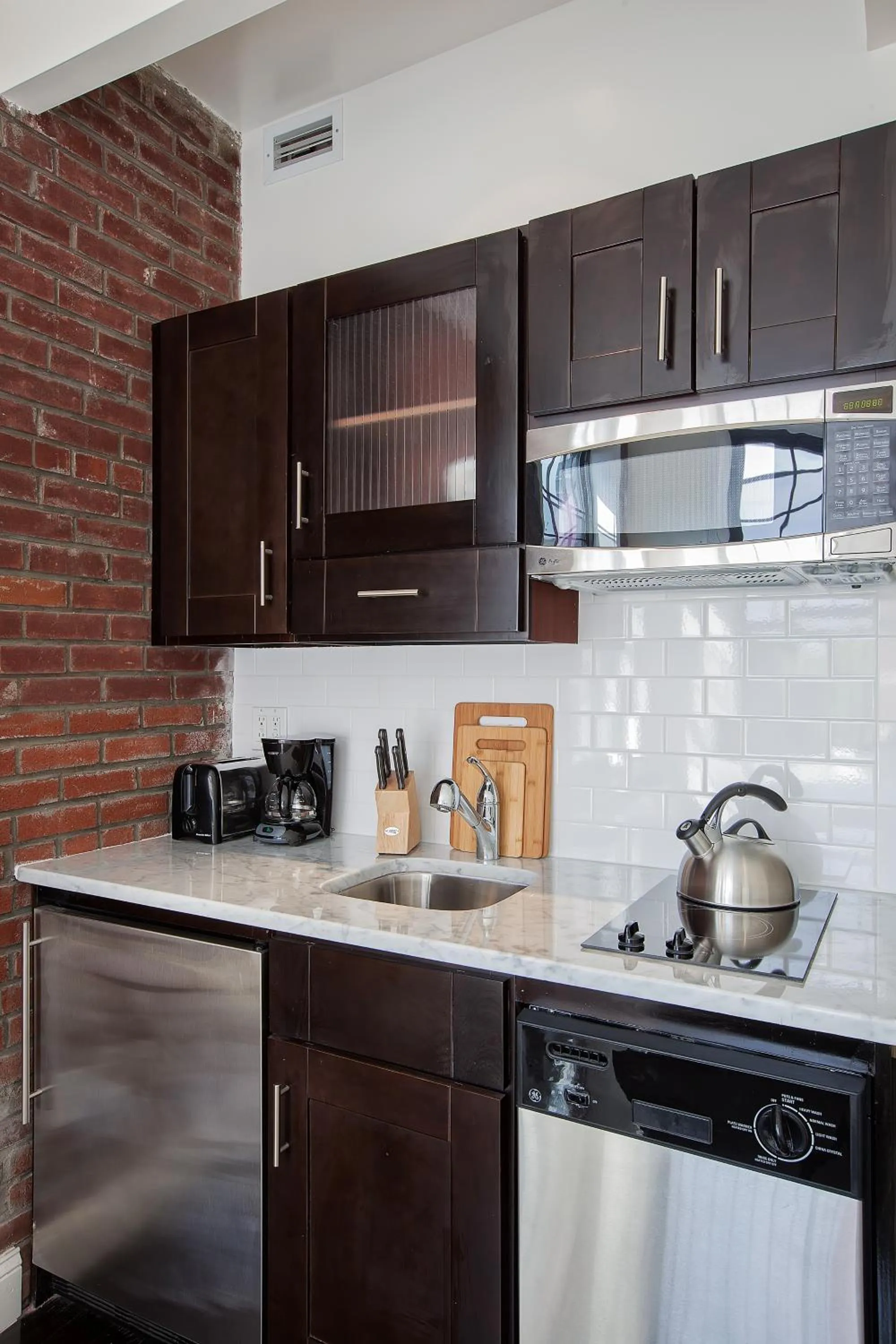 Kitchen or kitchenette in East Village Hotel