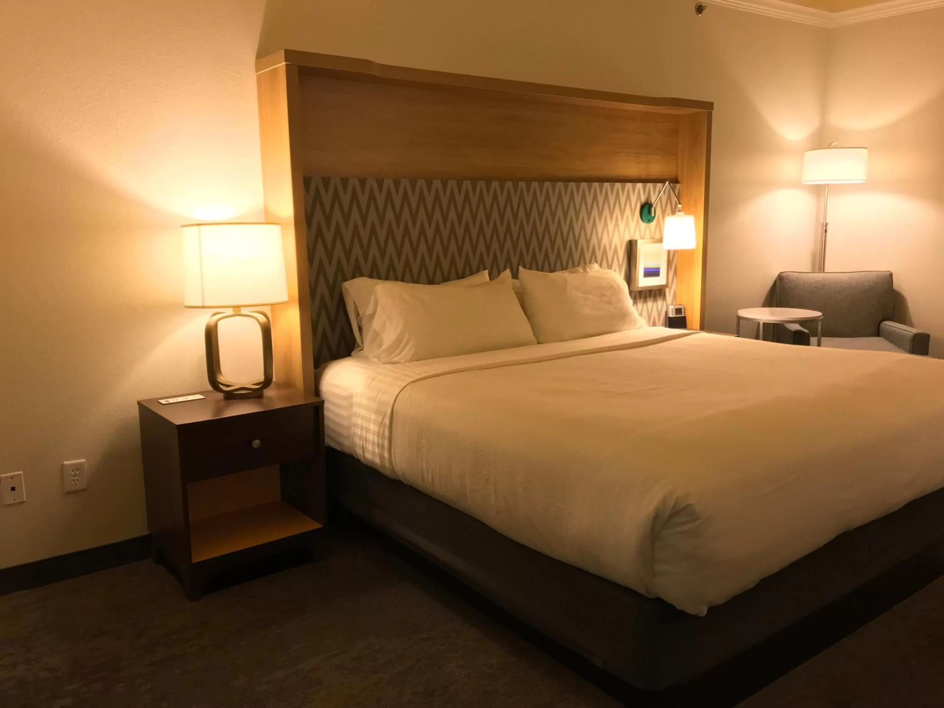 Photo of the whole room, Bed in Holiday Inn & Suites McKinney - N Allen by IHG