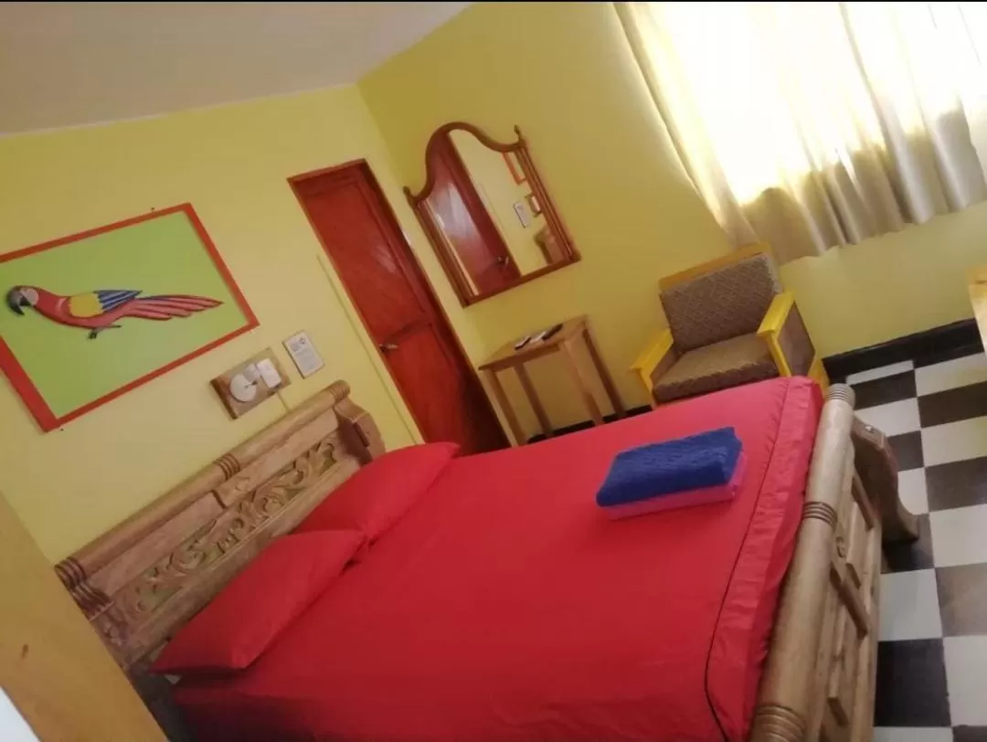 Photo of the whole room, Bed in Hotel Pueblito Playa