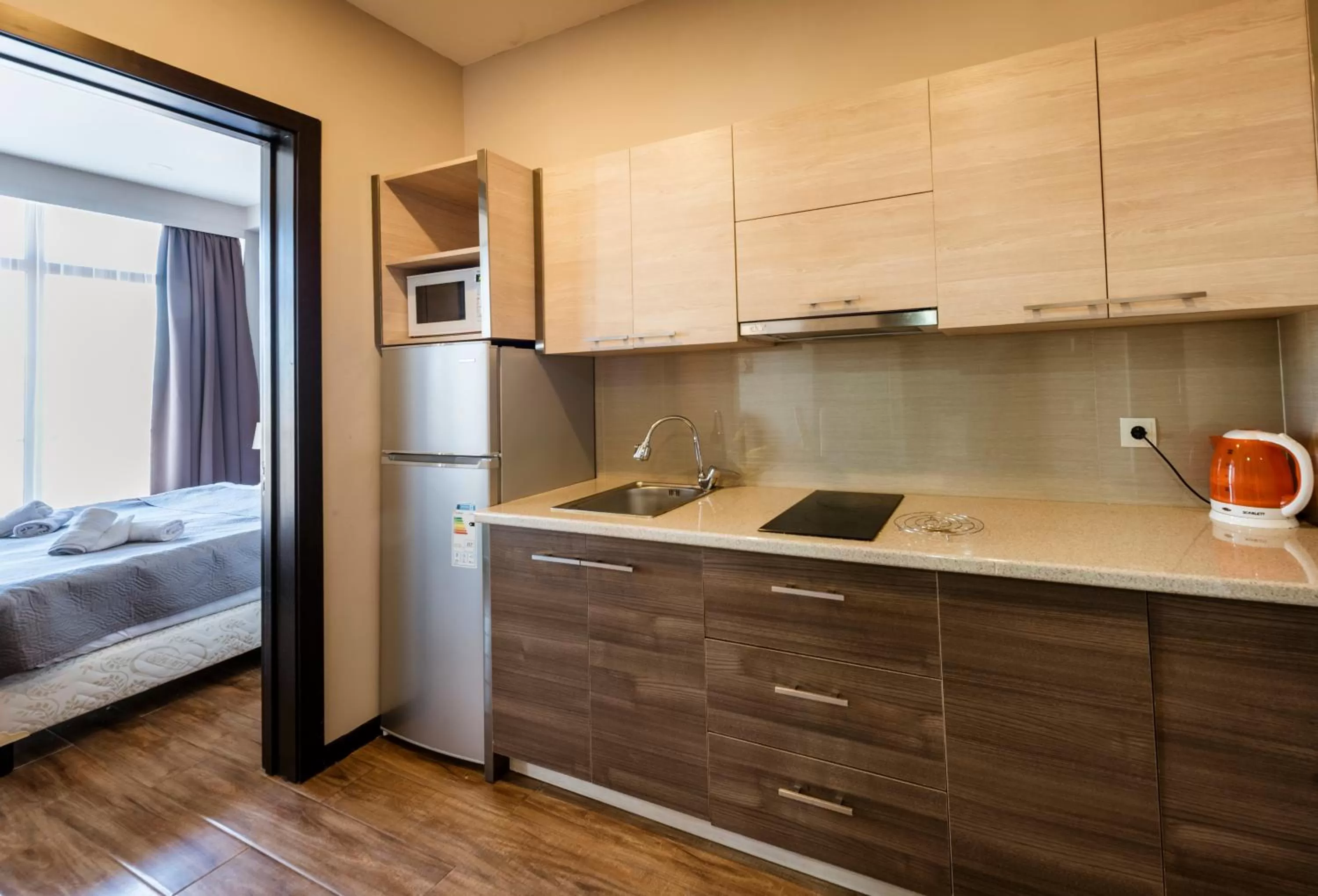 kitchen in Sani Apart Hotel