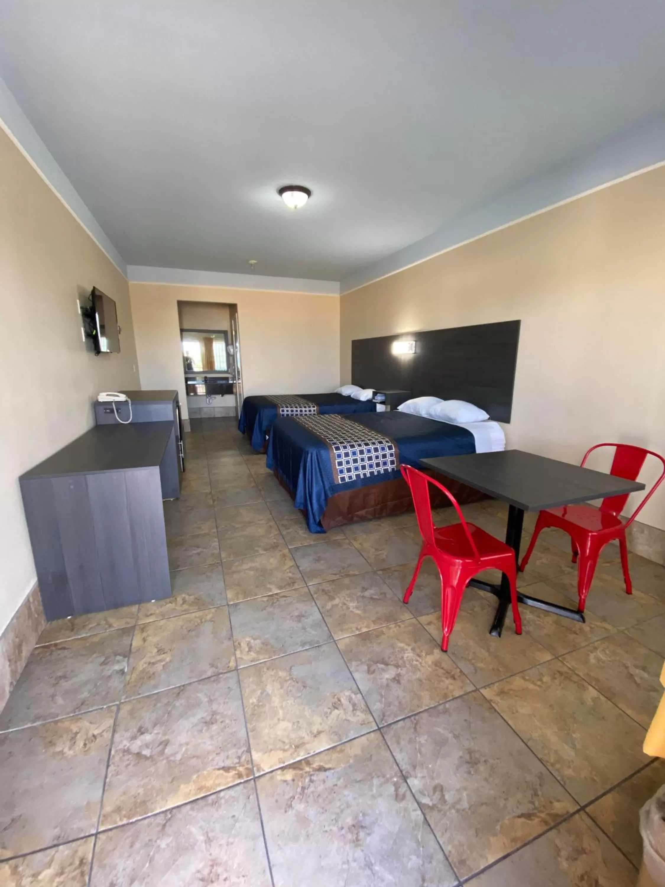 Bedroom in Texas Inn & Suites McAllen at La Plaza Mall and Airport