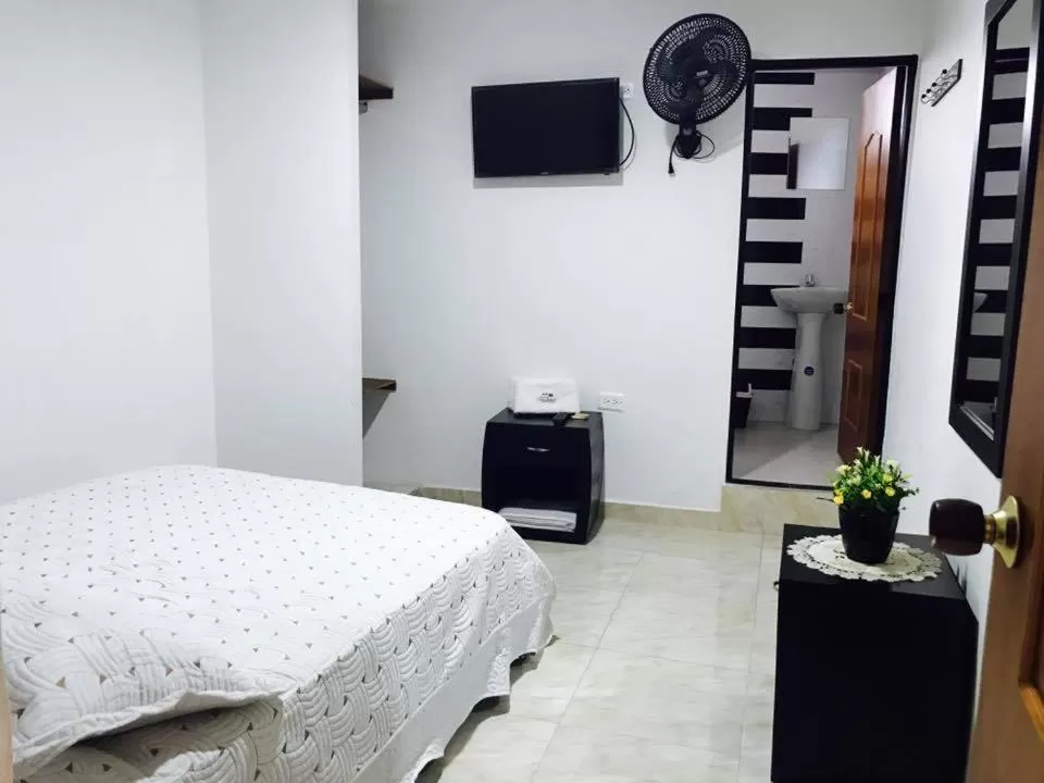 Bedroom, TV/Entertainment Center in Hotel Mirador de Santa Bárbara