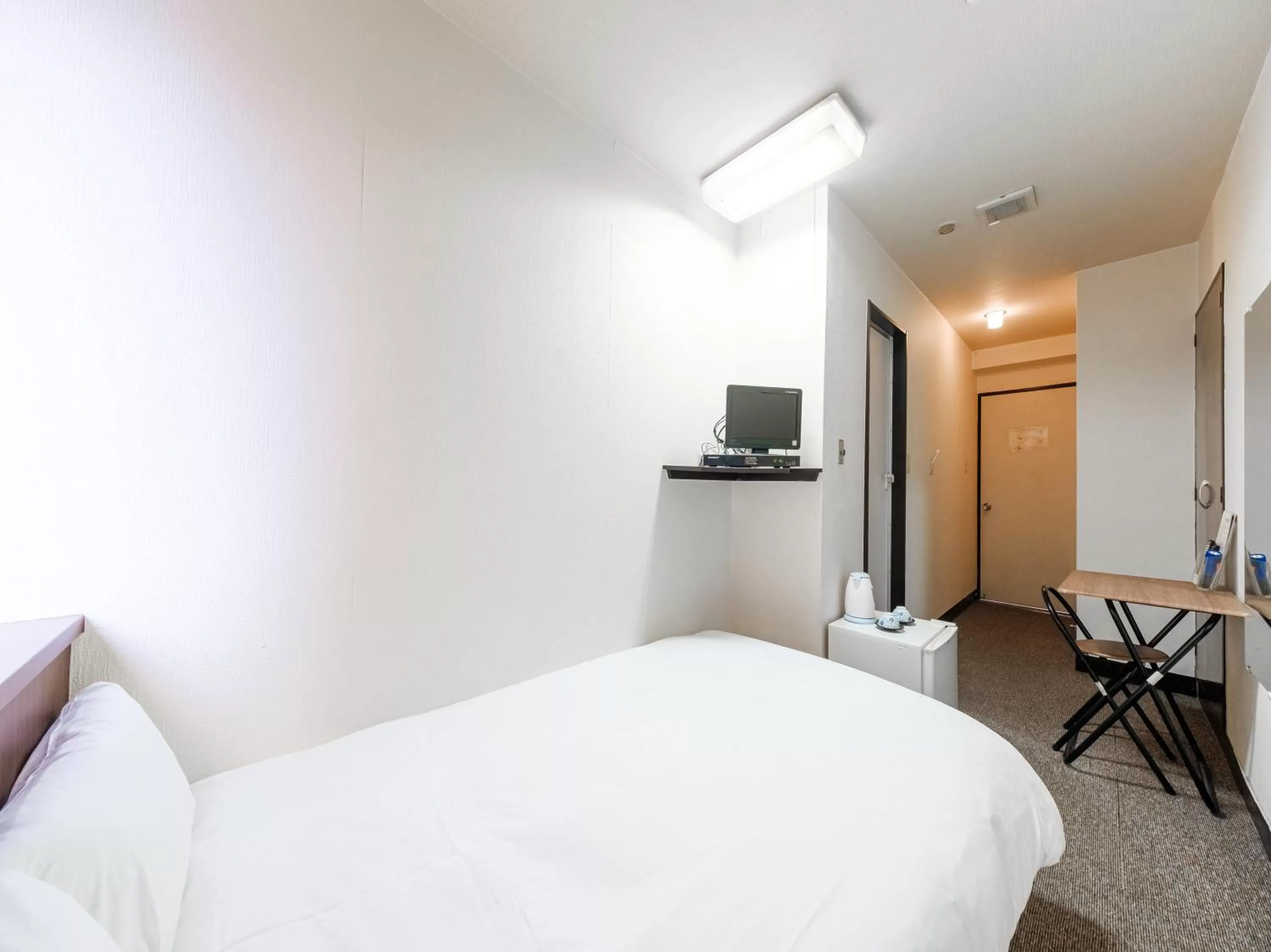 Bed in Tabist Hotel Tetora Hakodate Station