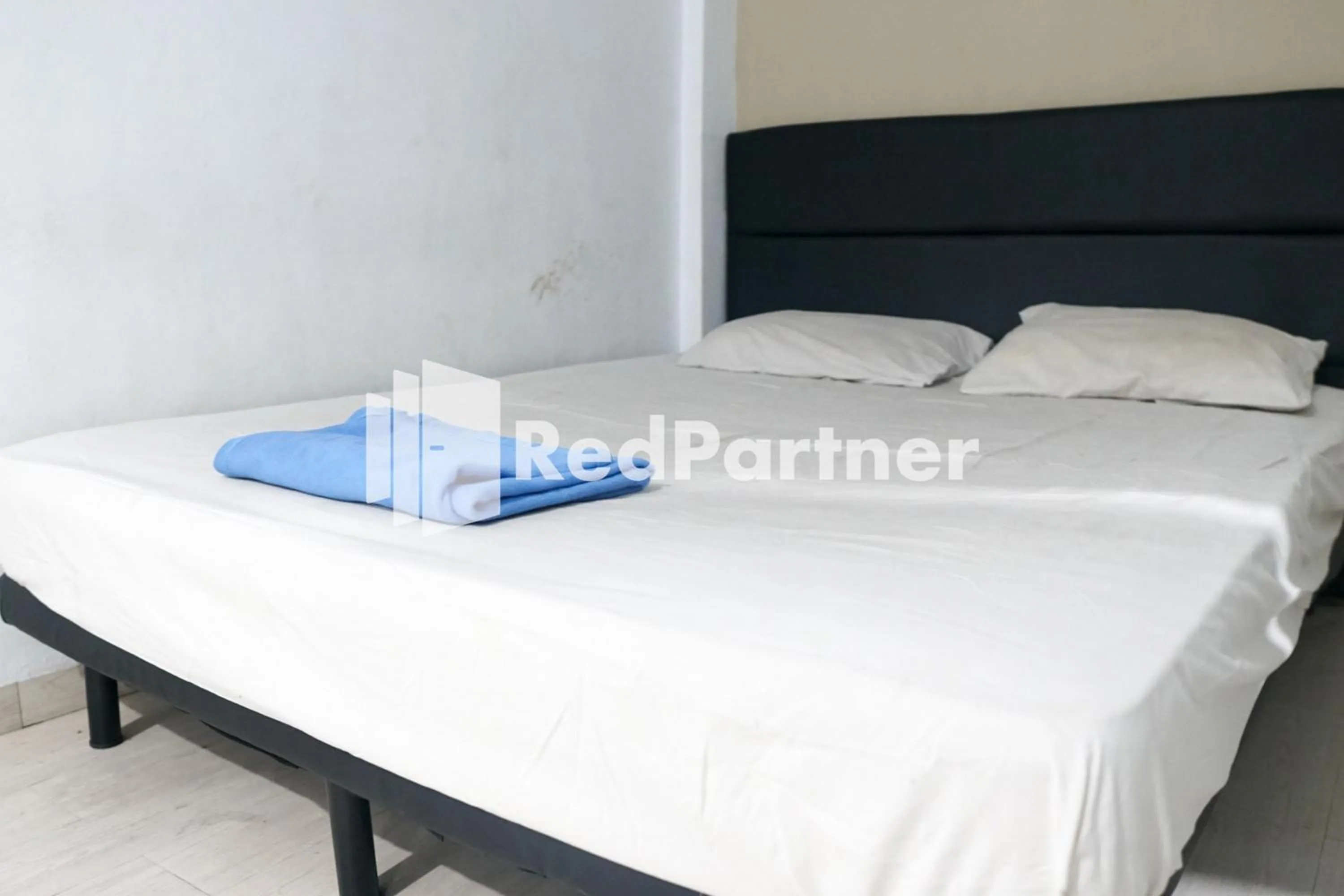 Bedroom in Cosmo Harmoni RedPartner