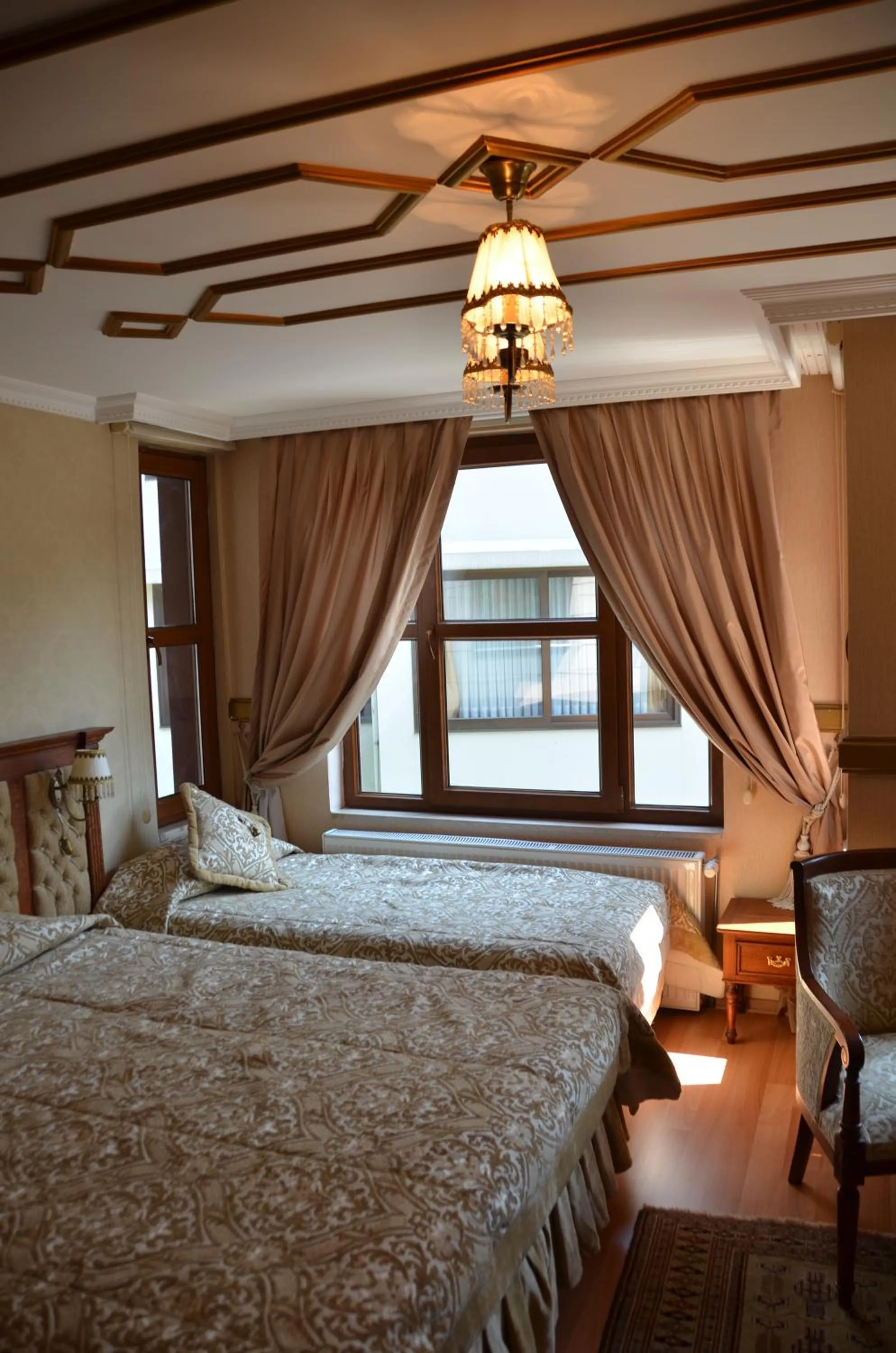 Photo of the whole room, Bed in Aruna Boutique Hotel