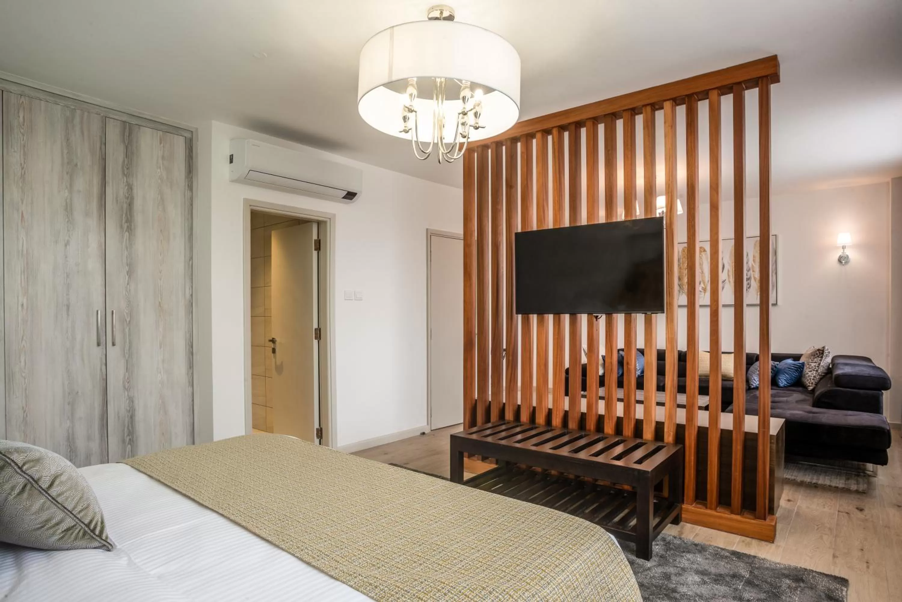 Seating area, Bed in Yaya Hotel & Apartments