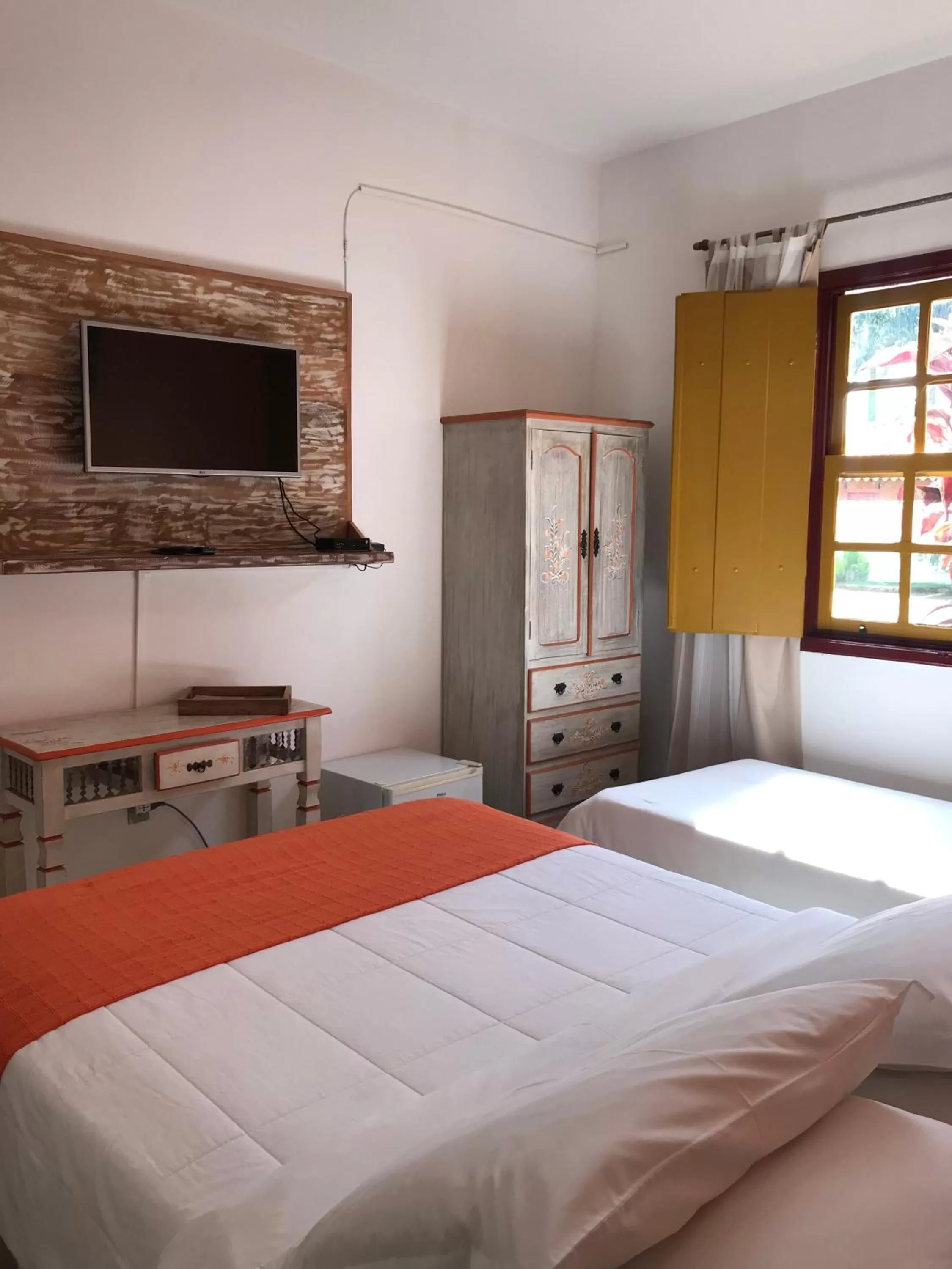 Bed in Pousada Neuza Barbosa