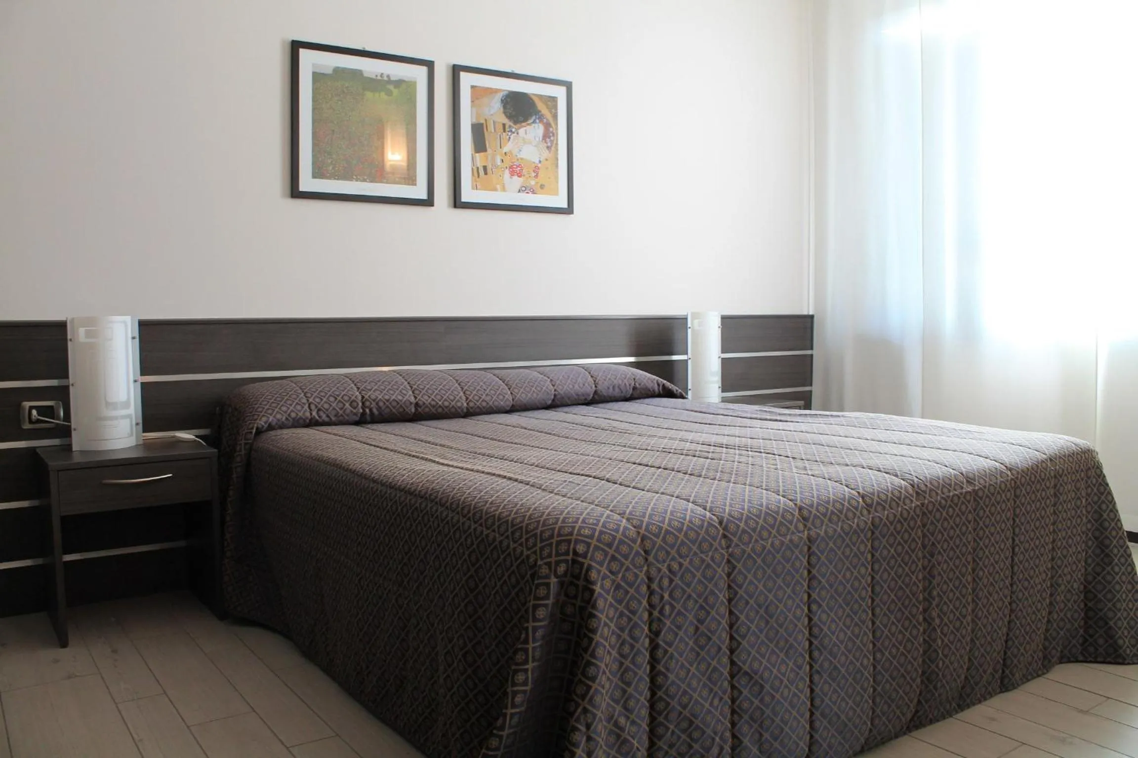 Bed in Hotel Residence Aurora