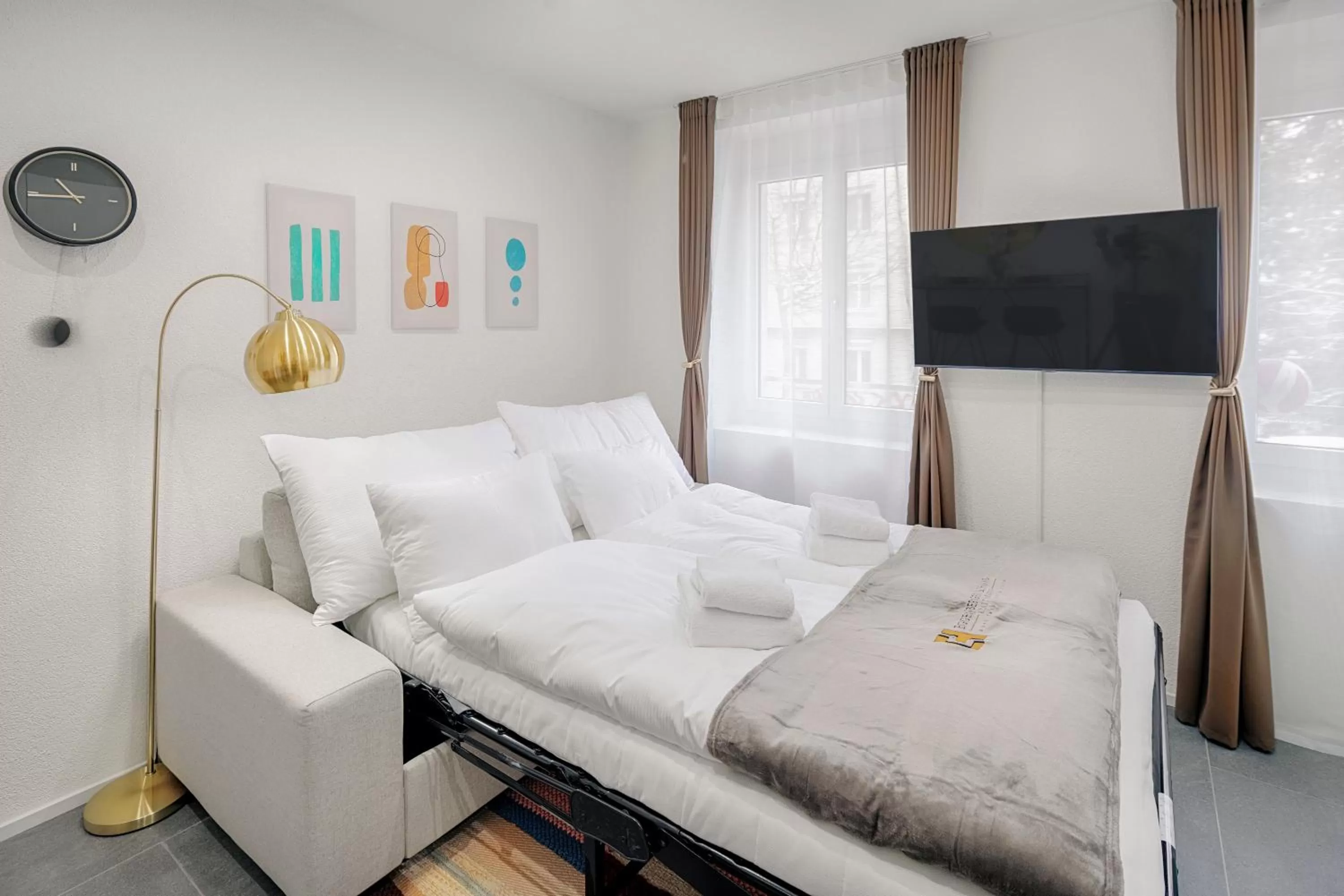 Bed in VISIMO Apartments St Georgen-Strasse St Gallen - Design City Nature