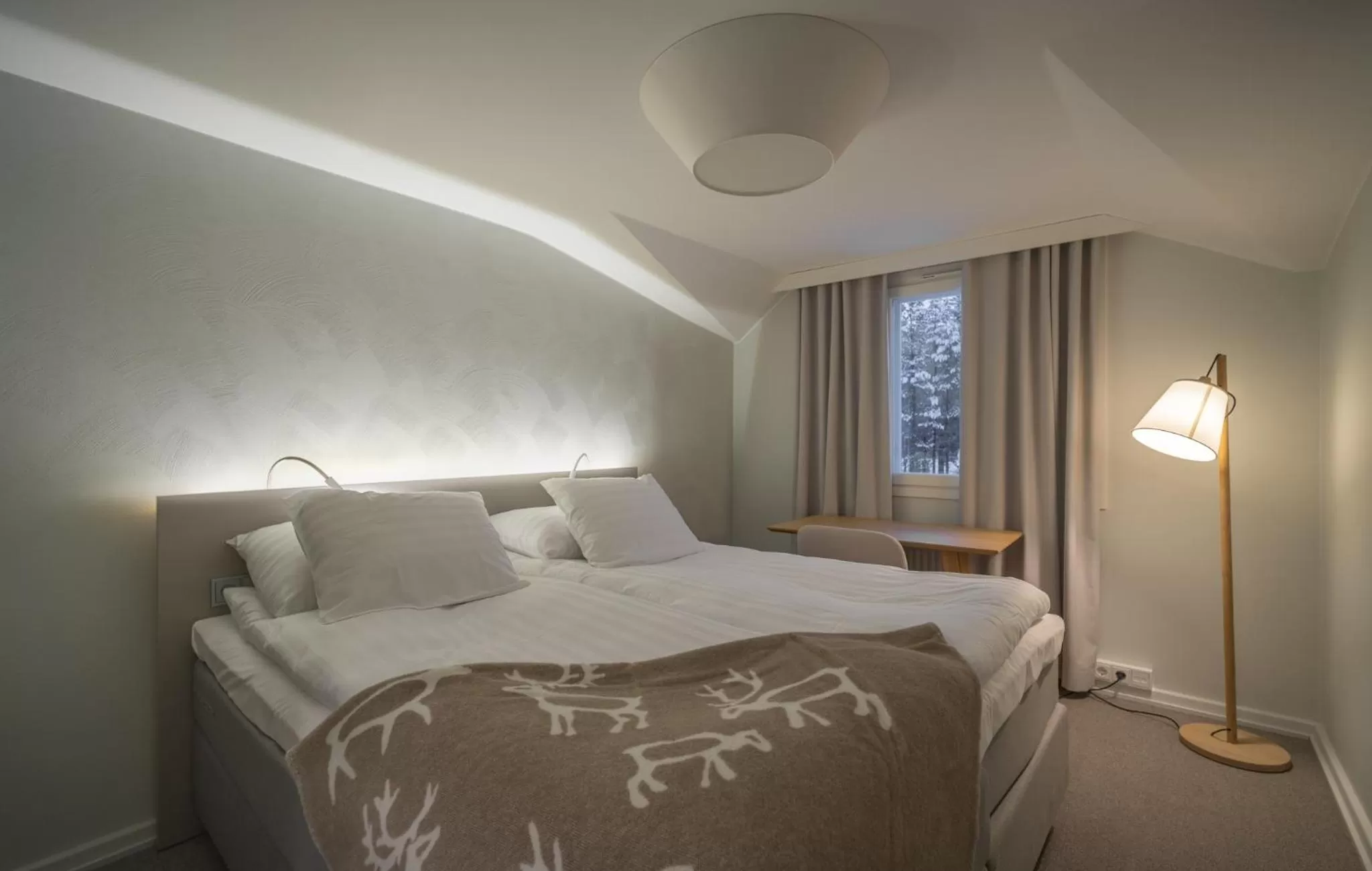 Bed in Wilderness Hotel Juutua