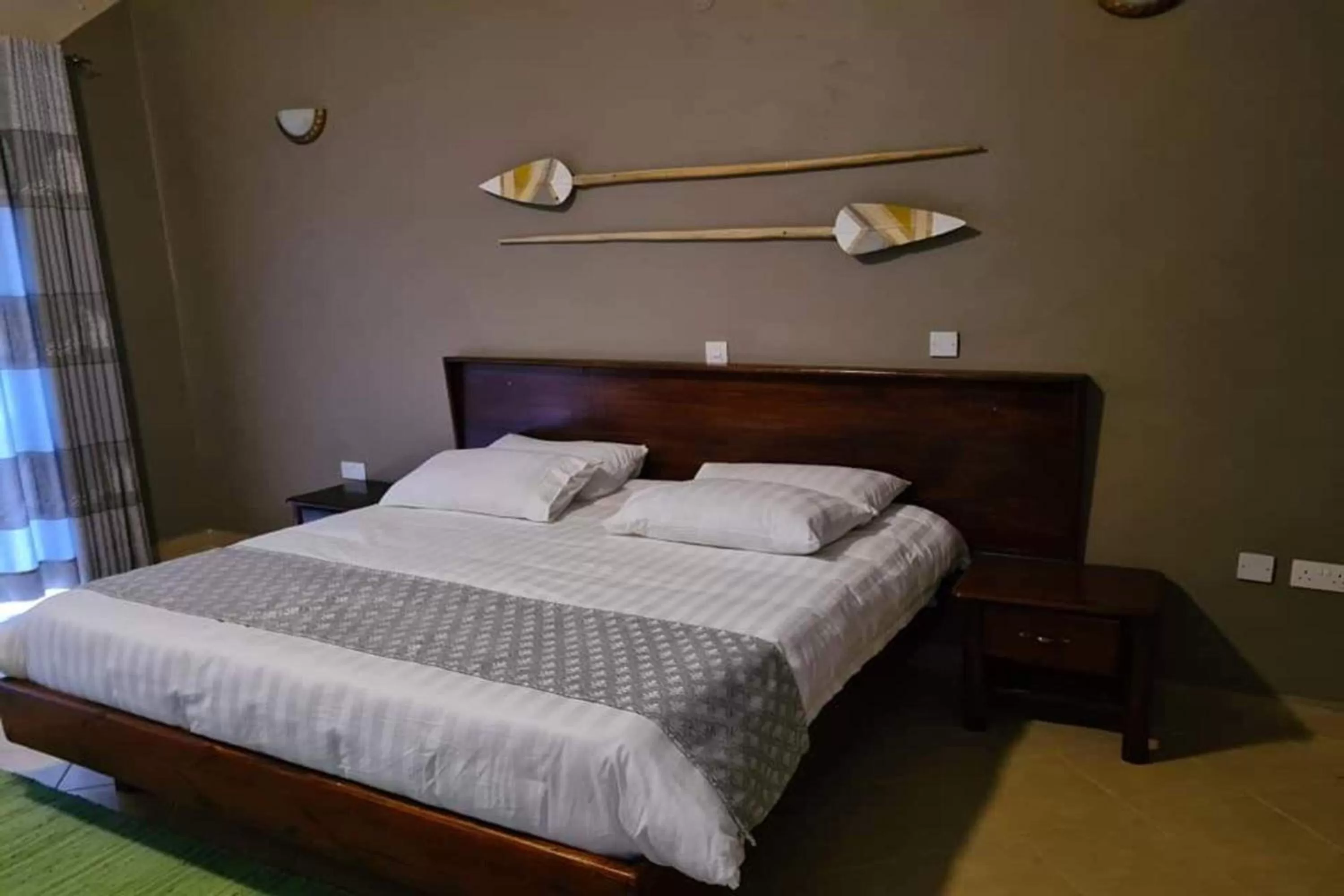 Bed in Bunyonyi Overland Resort