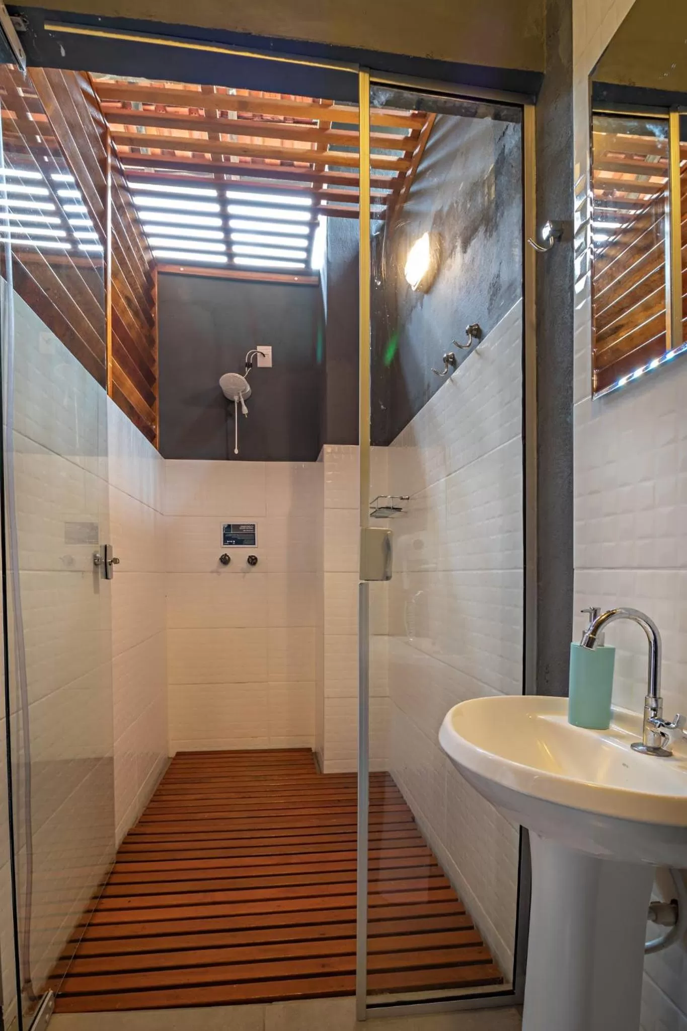 Bathroom in Suítes no Quintal