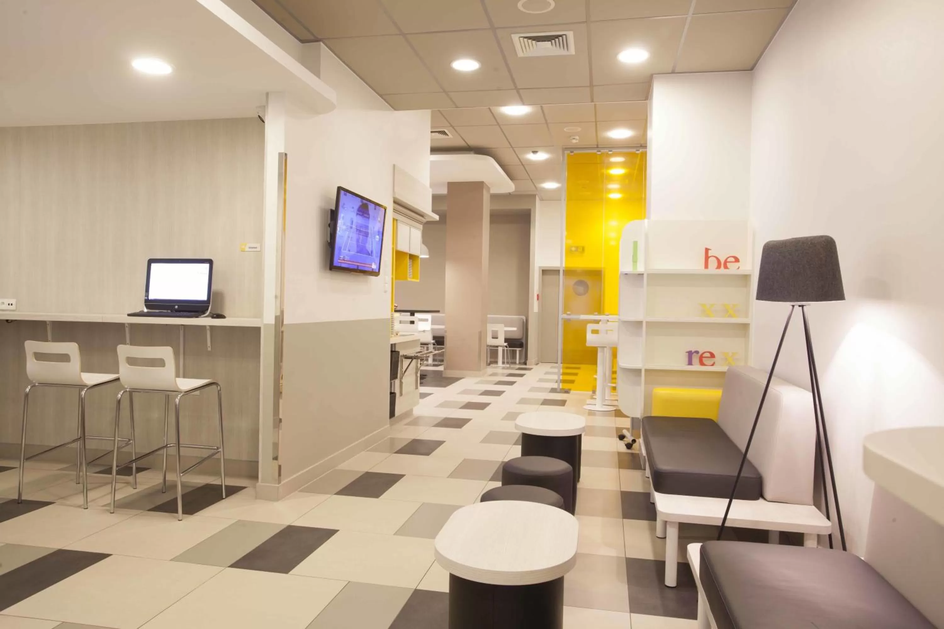 Communal lounge/ TV room in Premiere Classe Warszawa Centrum