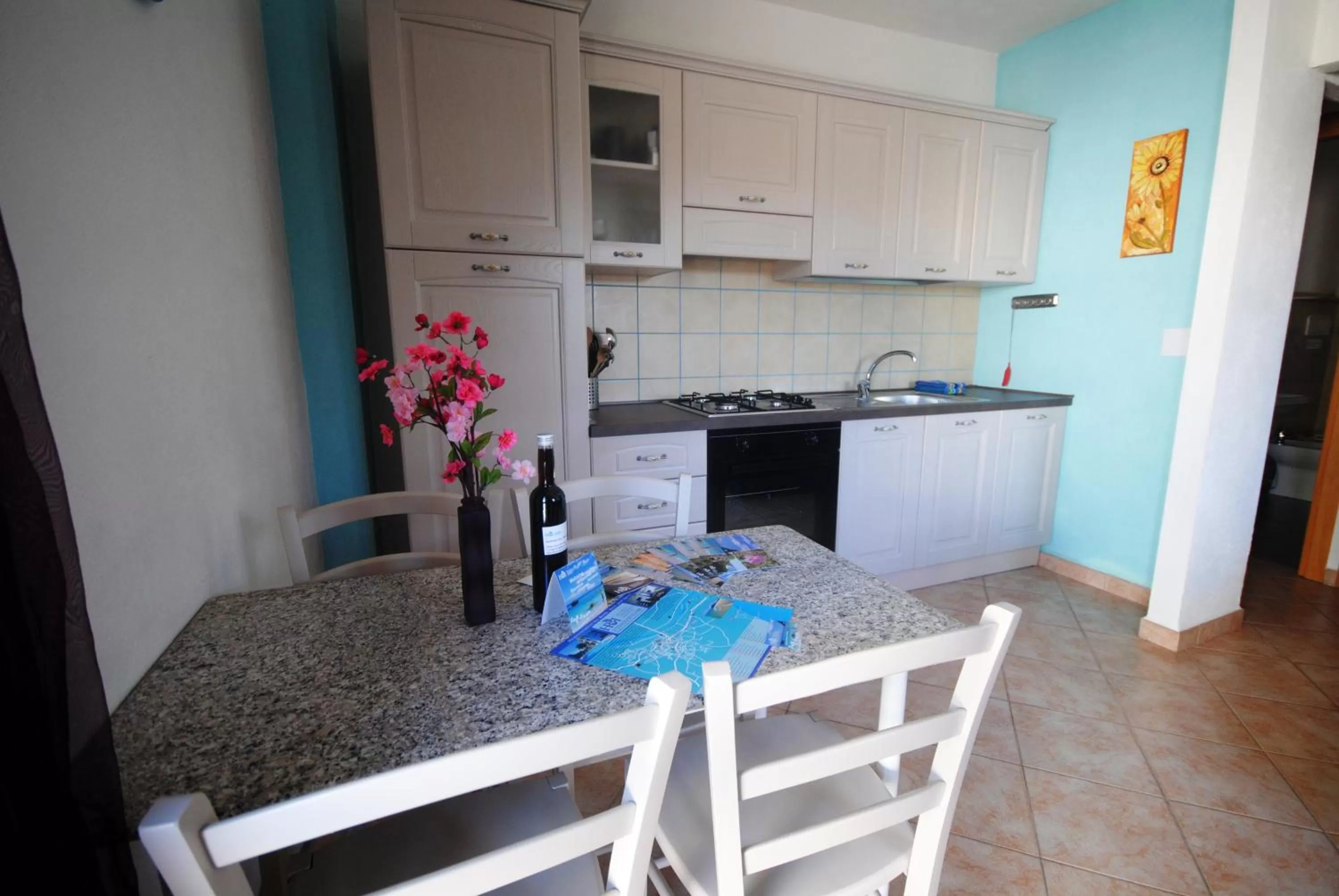 Kitchen or kitchenette in Holiday Residence Rifugio