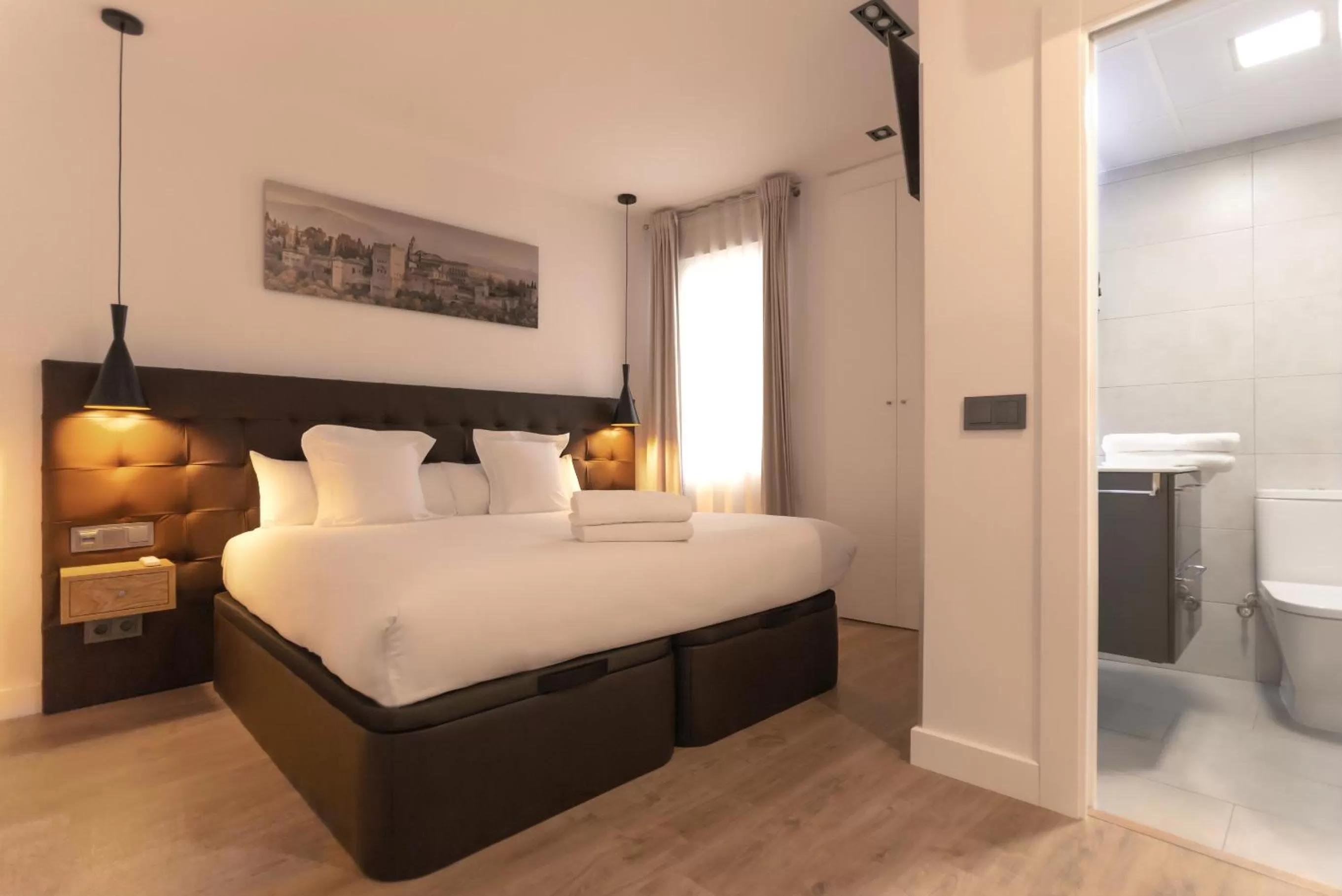 Bed in Woohoo Rooms Hortaleza