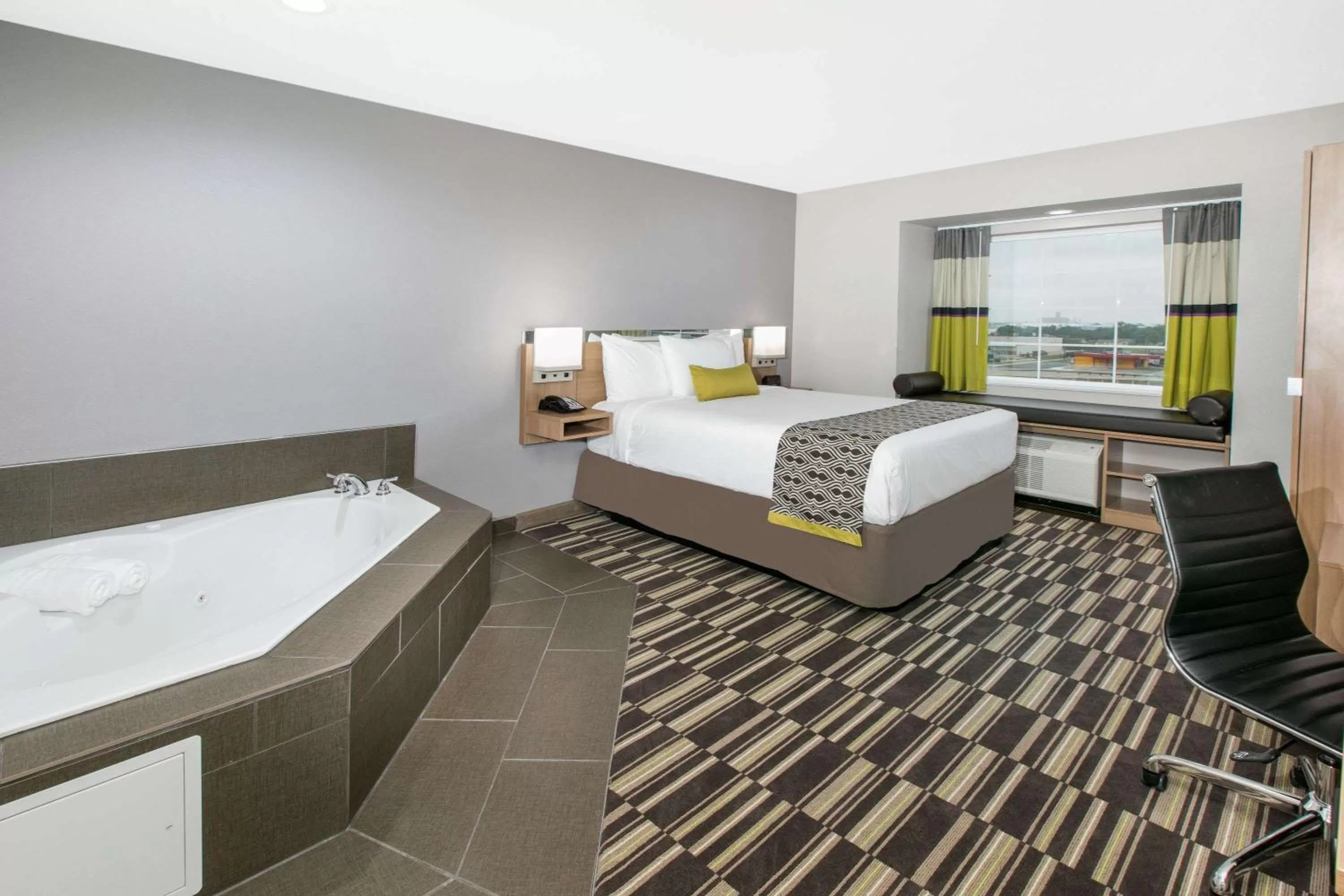 Hot Tub, Bed in Microtel Inn & Suites by Wyndham Lubbock