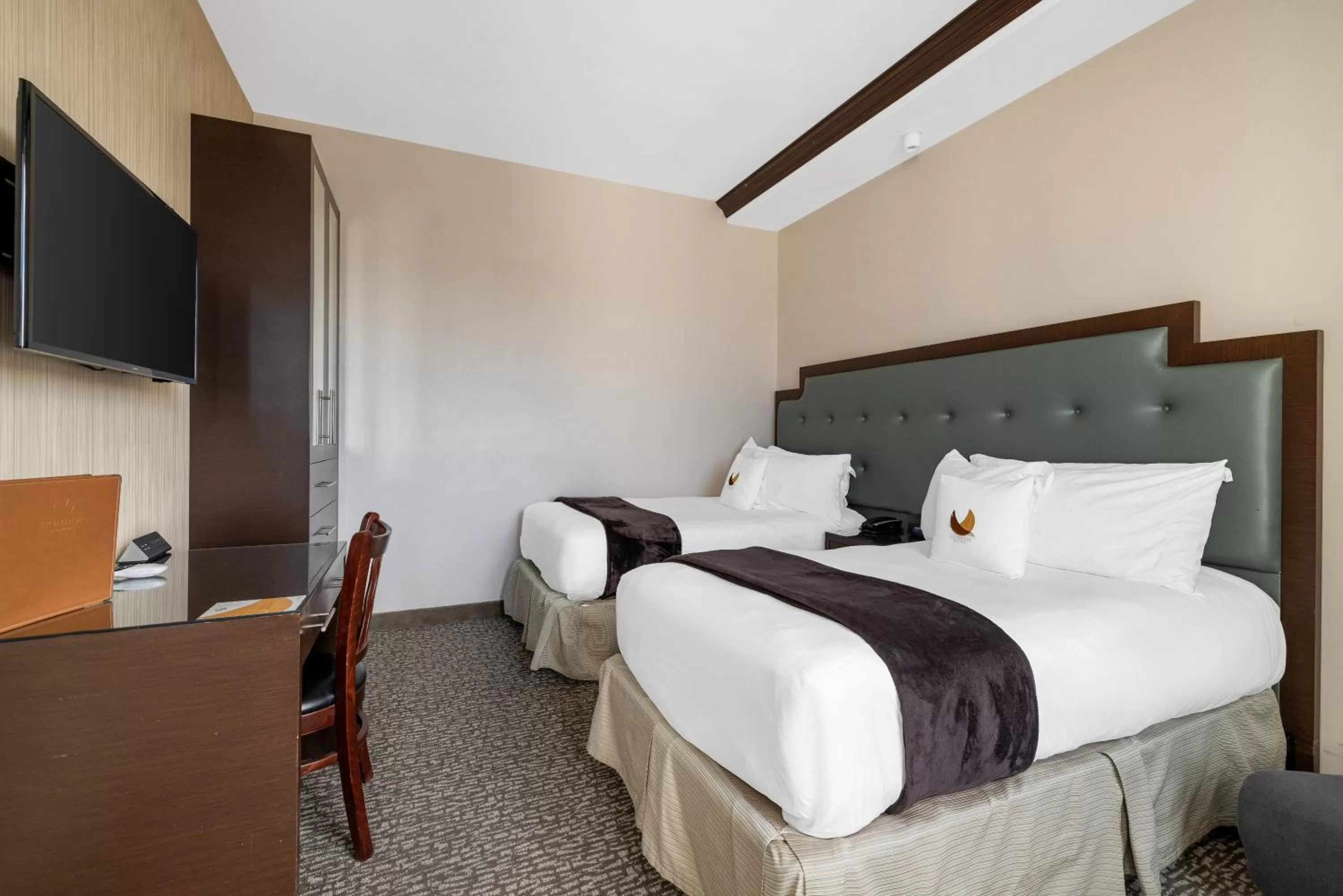 Bed in Aura Hotel Brooklyn