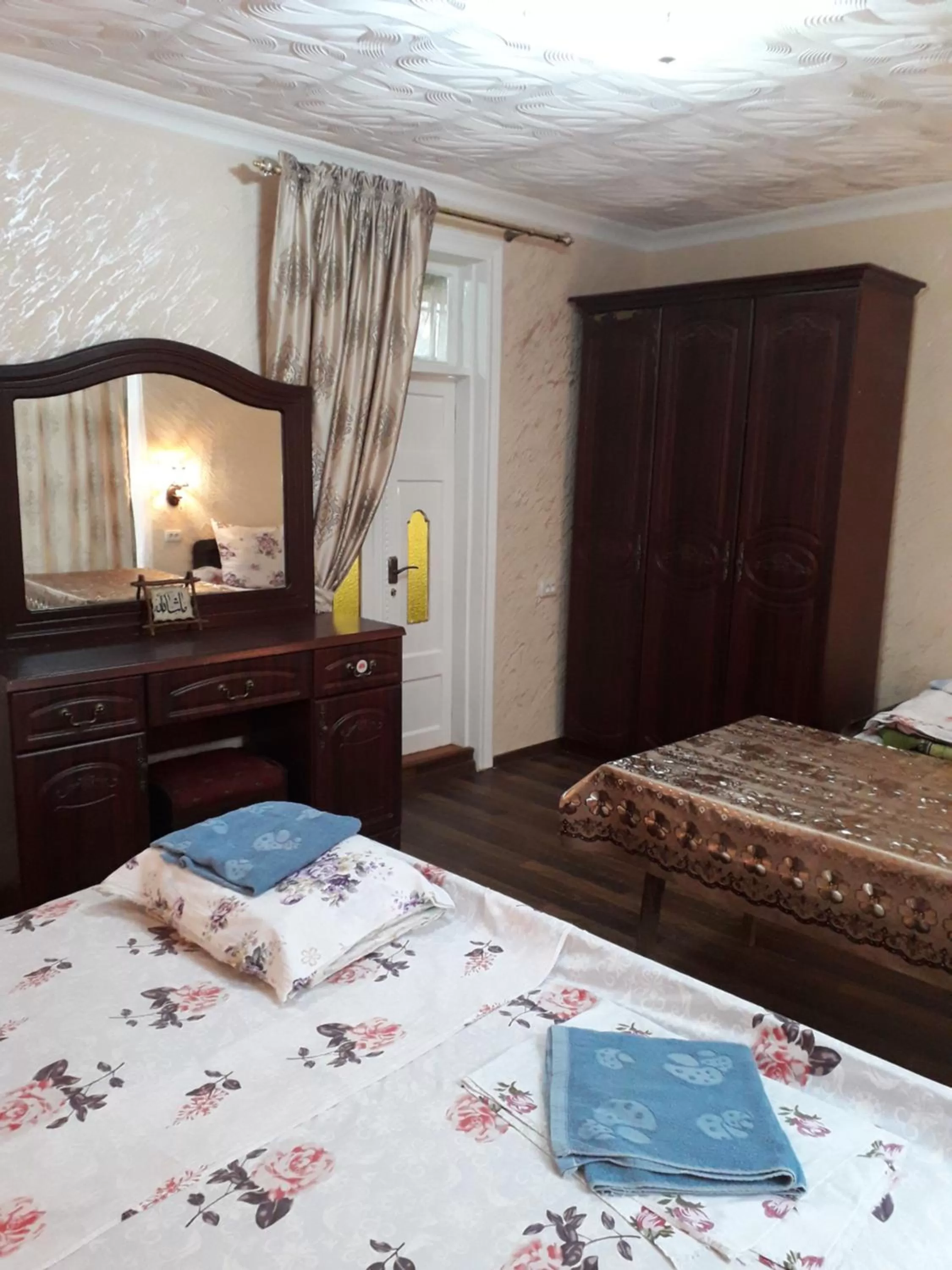 Bed in B&B Bahodir