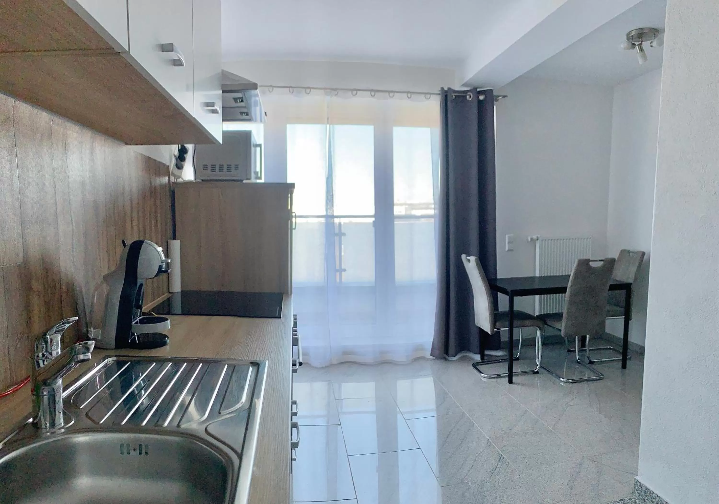 Kitchen or kitchenette in Pent - Aparthotel Crailsheim