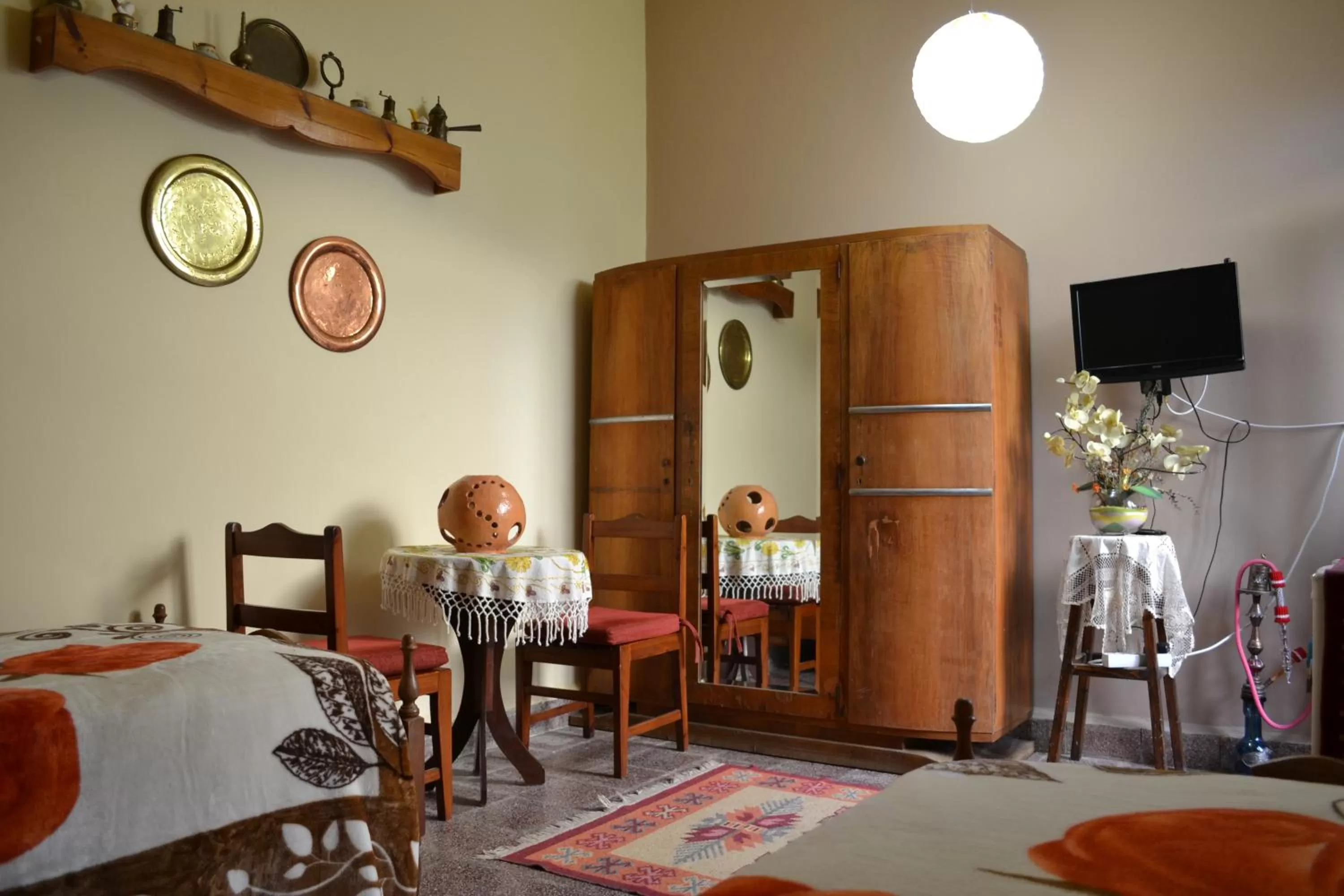 Photo of the whole room, TV/Entertainment Center in Mystery Garden Guest House