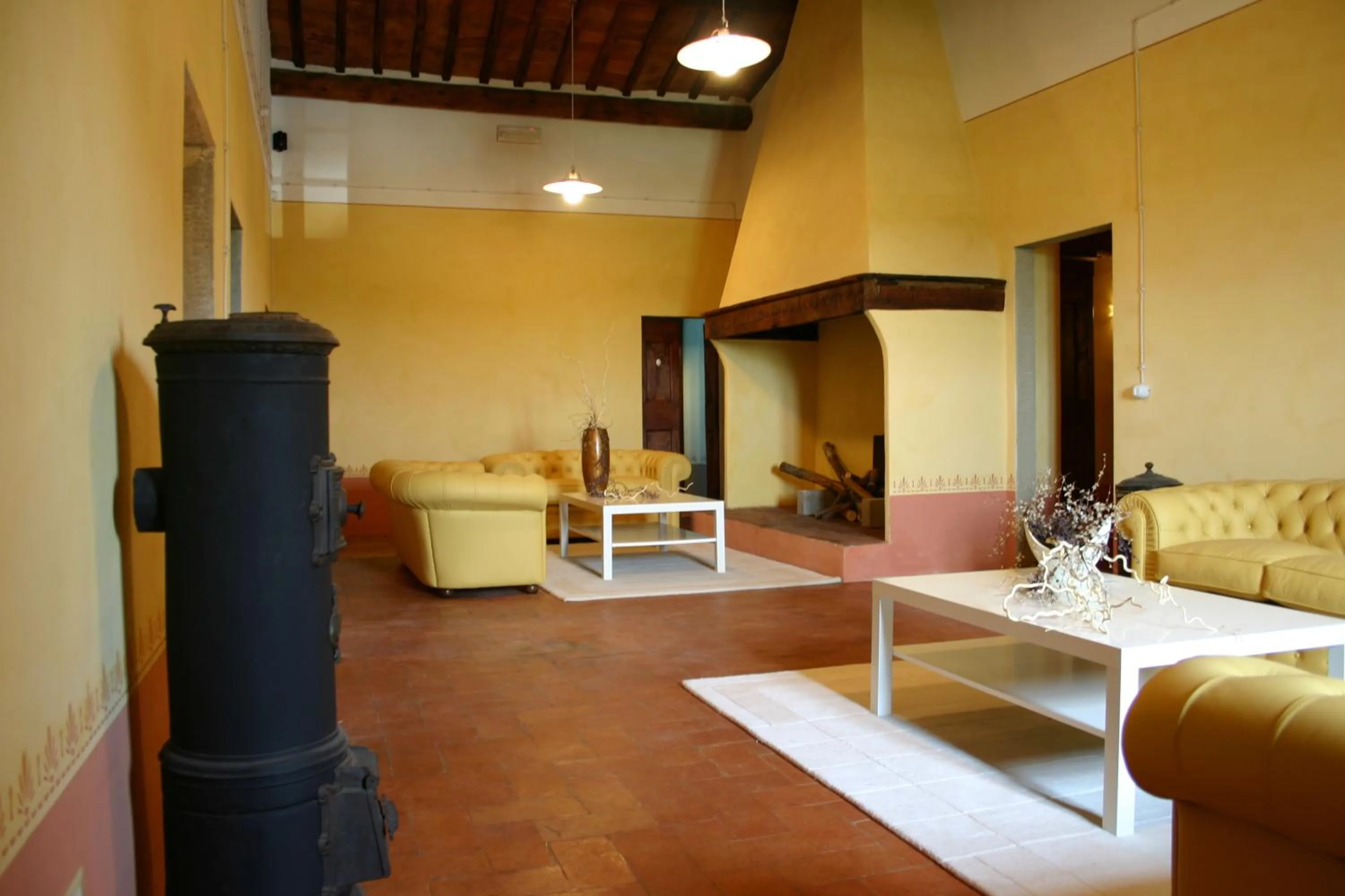 Communal lounge/ TV room, Seating Area in Hotel Le Capanne