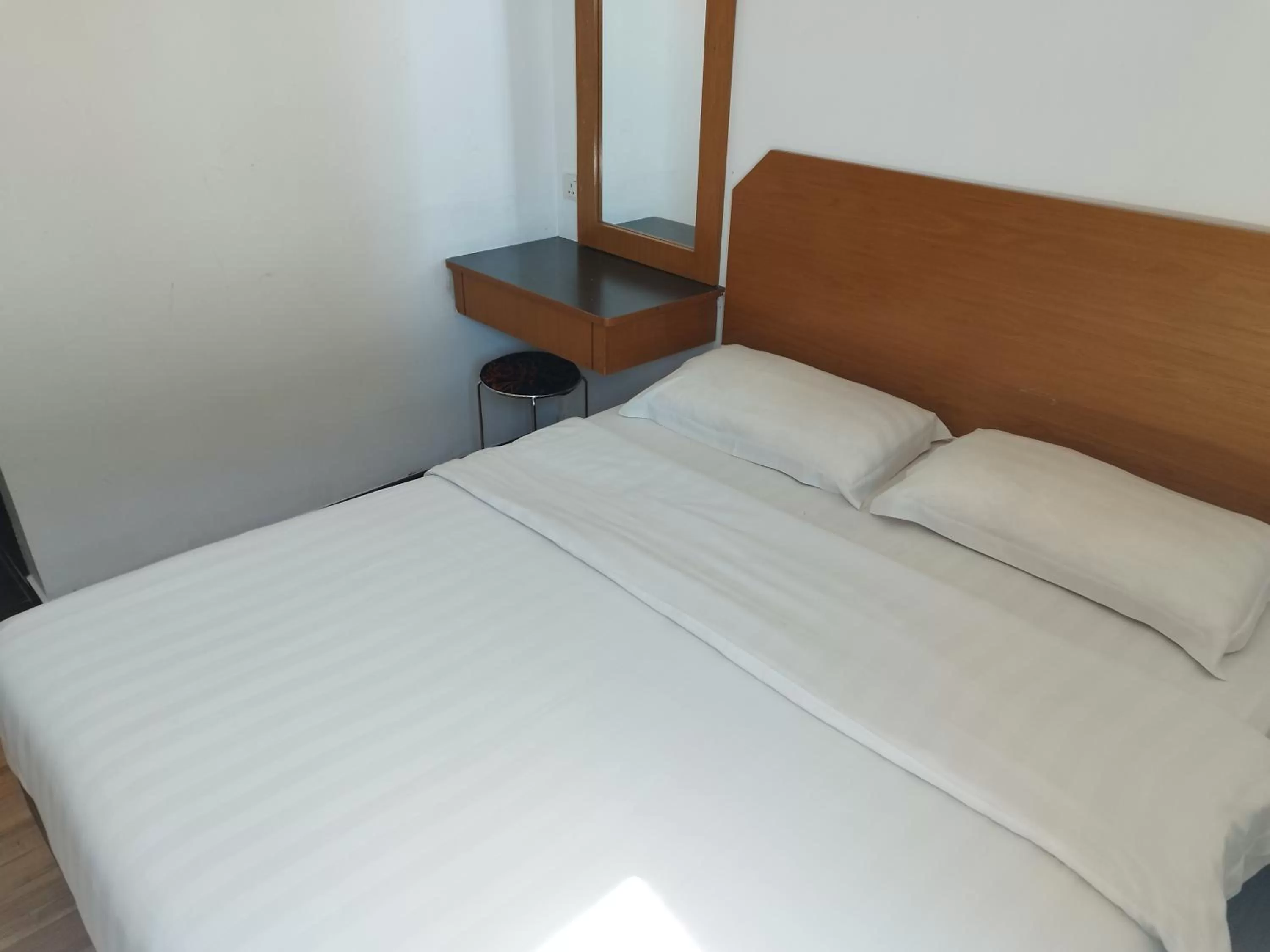 Bed in Marine Bay Hotel