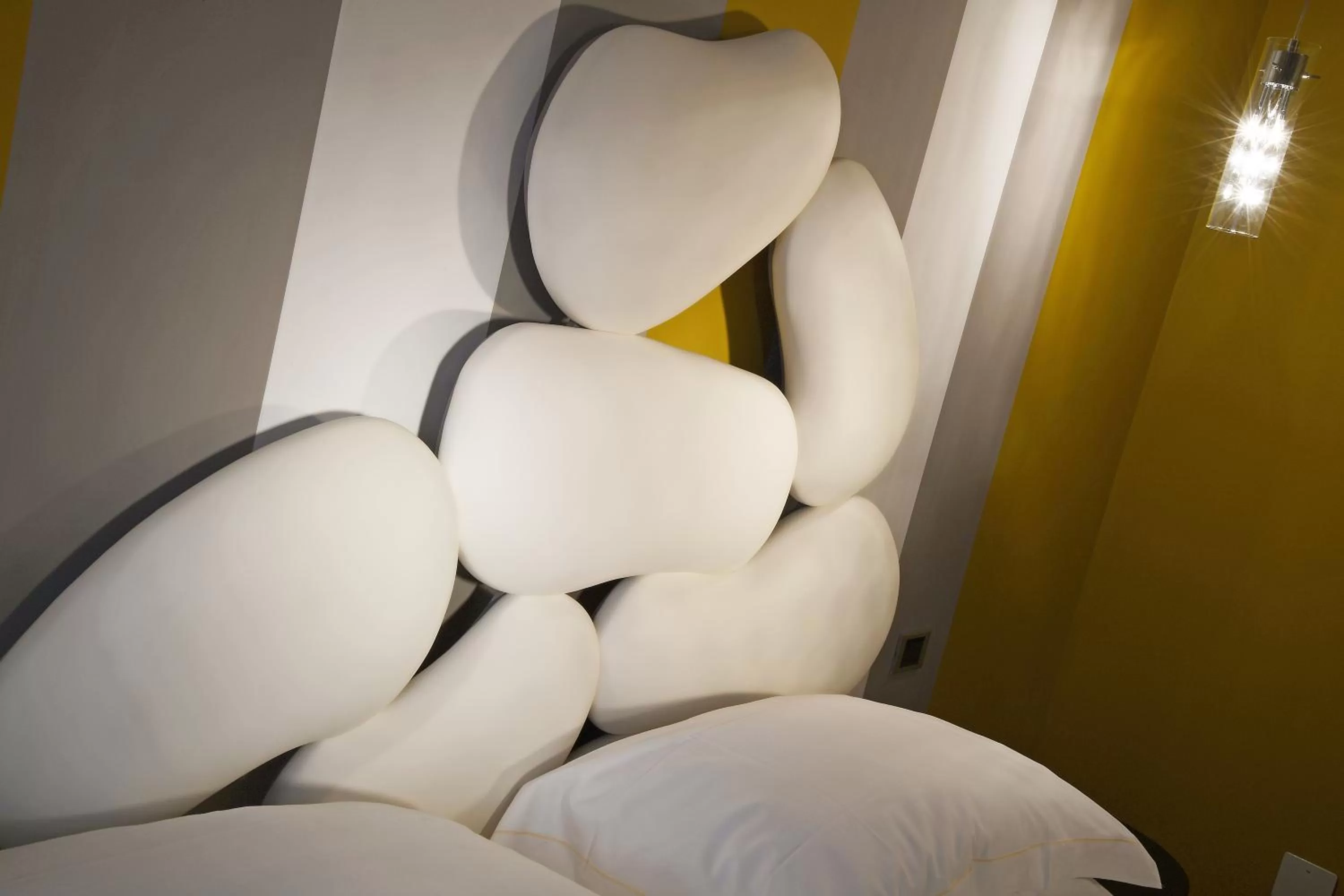 Decorative detail, Bed in Panoramic Villa Garassino - country rooms and fine restaurant