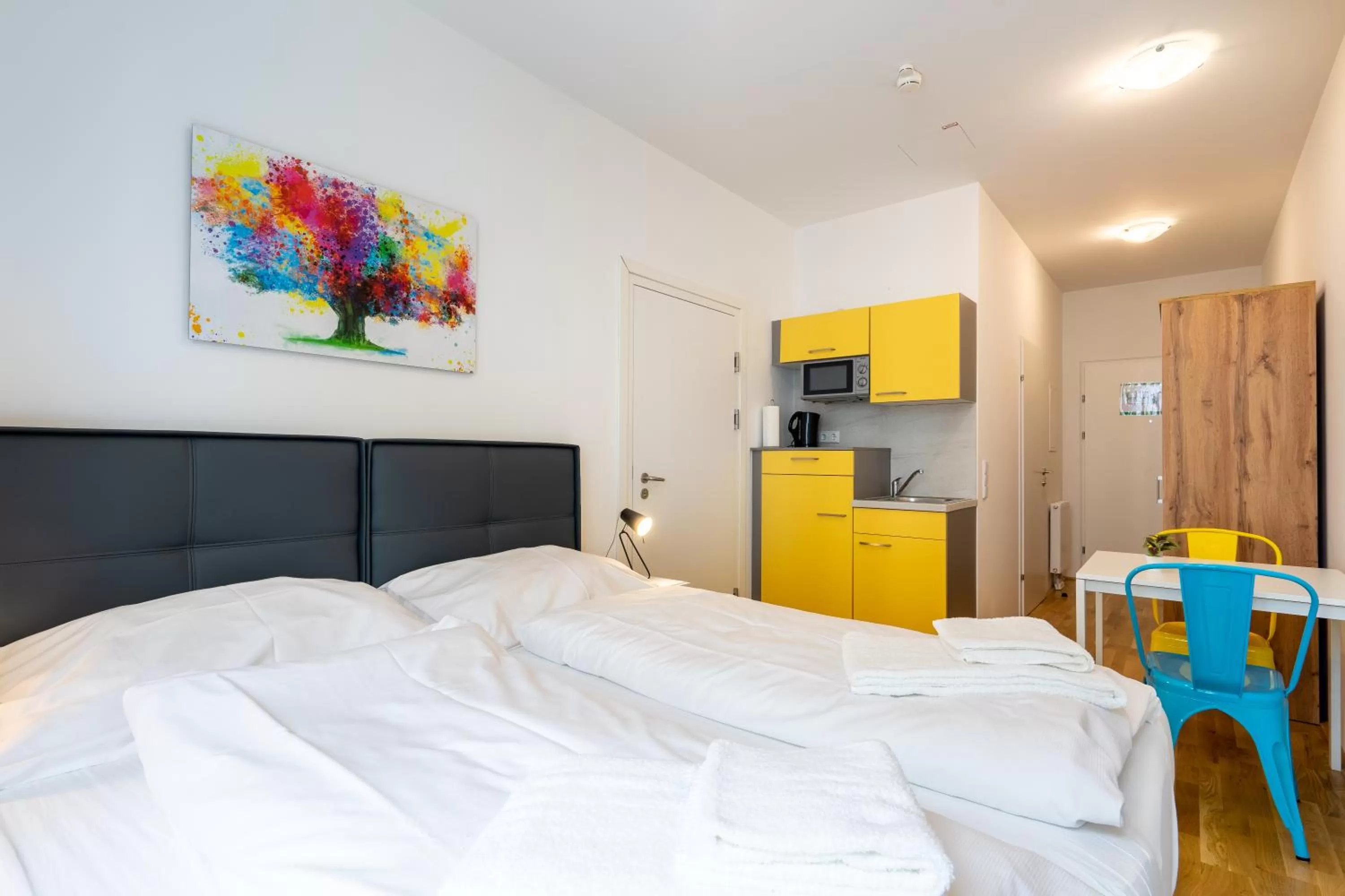 Bed in FeelGood Apartments SmartLiving | contactless check-in