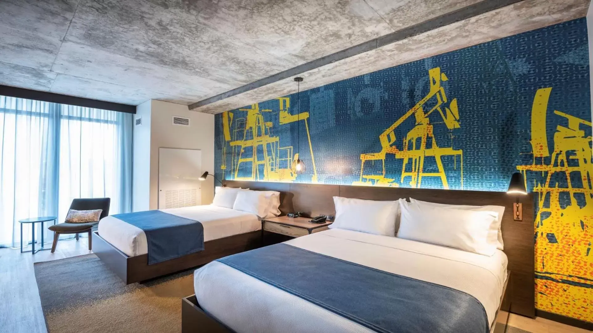 Queen Room with Two Queen Beds and Mobility Accessible Roll-In Shower in Hotel Indigo Tulsa DWTN/Entertainment Area Queen Room with Two Queen Beds and Mobility Accessible Roll-In Shower in Hotel Indigo Tulsa DWTN/Entertainment Area