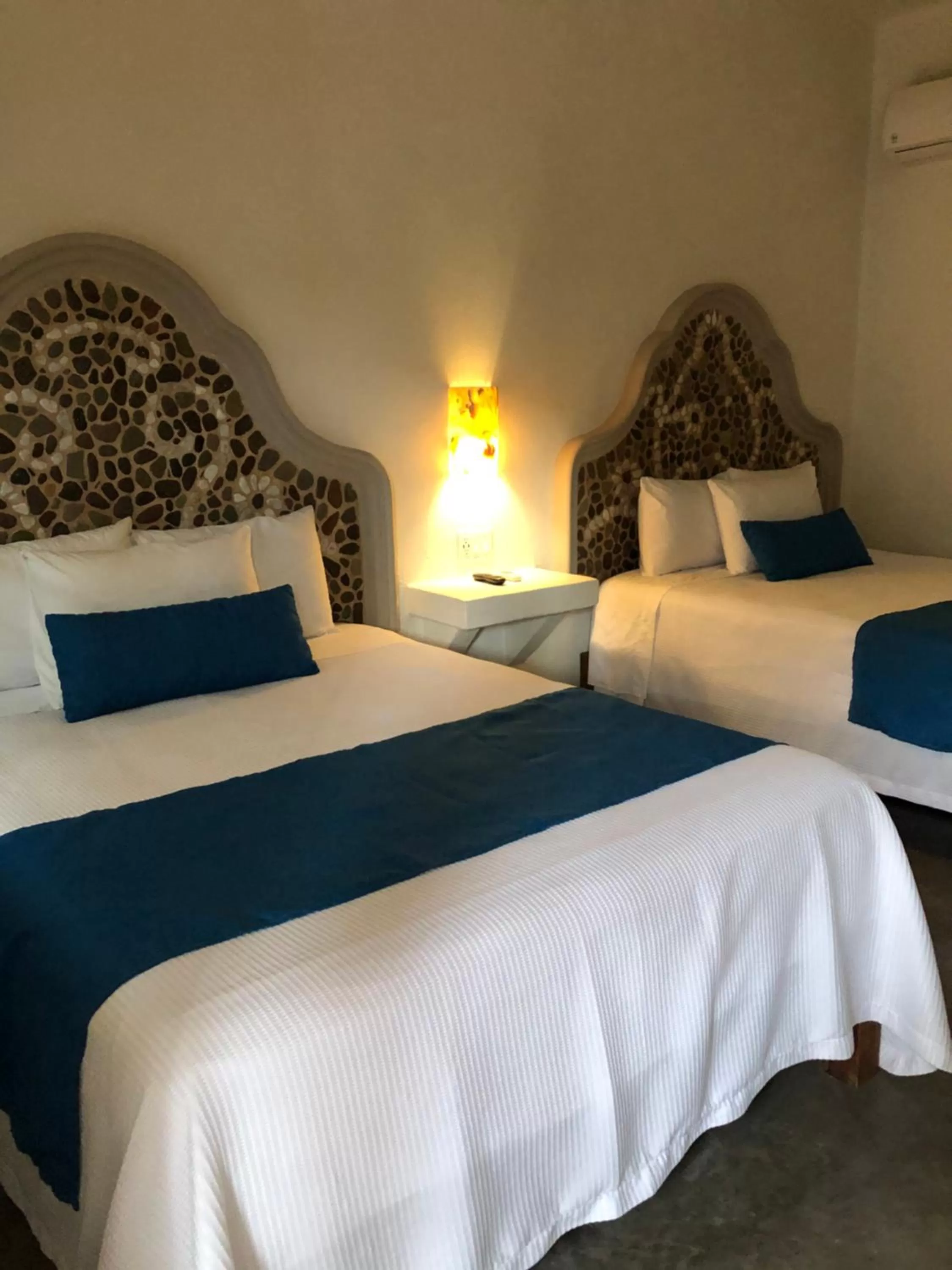 Bed in Paraiso Azul Hotel