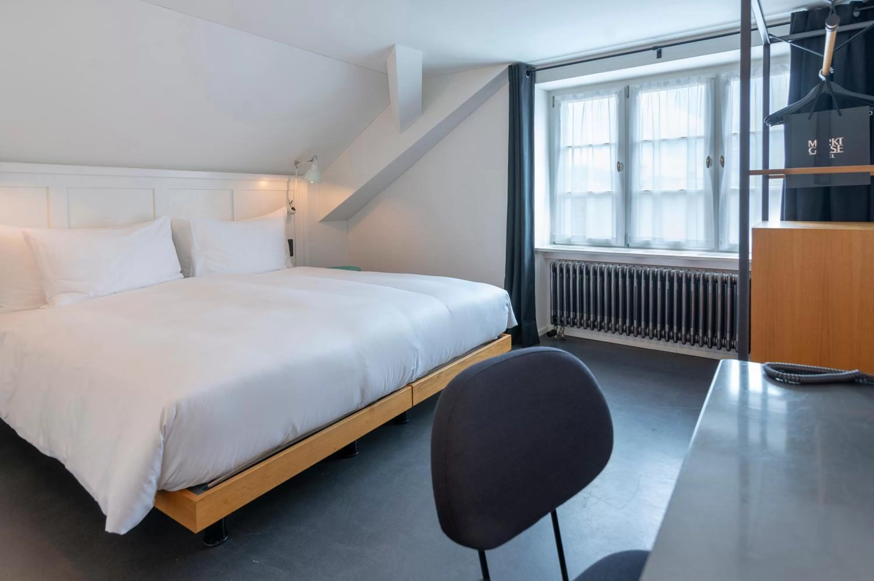 Photo of the whole room, Bed in Marktgasse Hotel