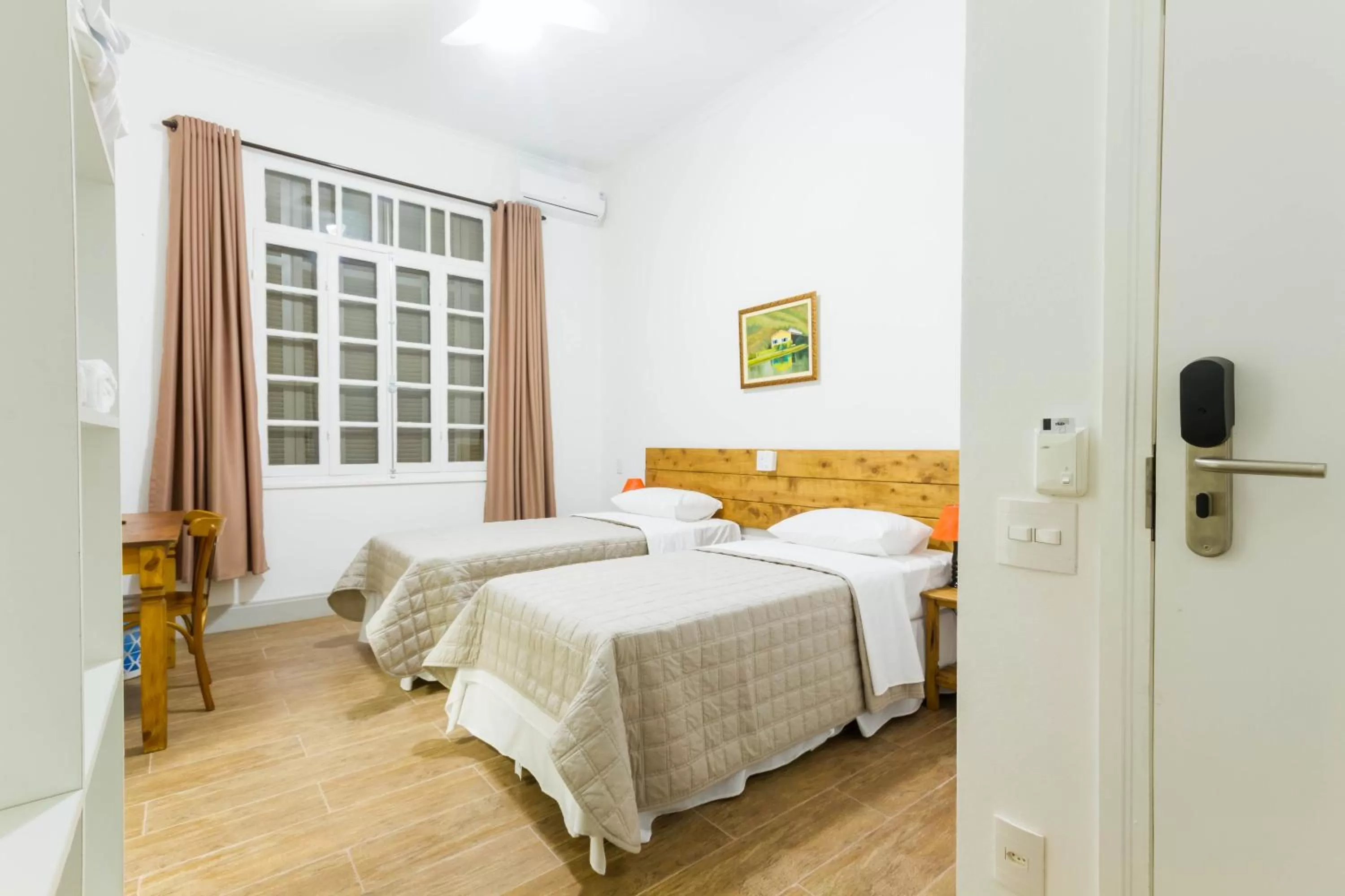 Bed in Pousada Sagrados Corações