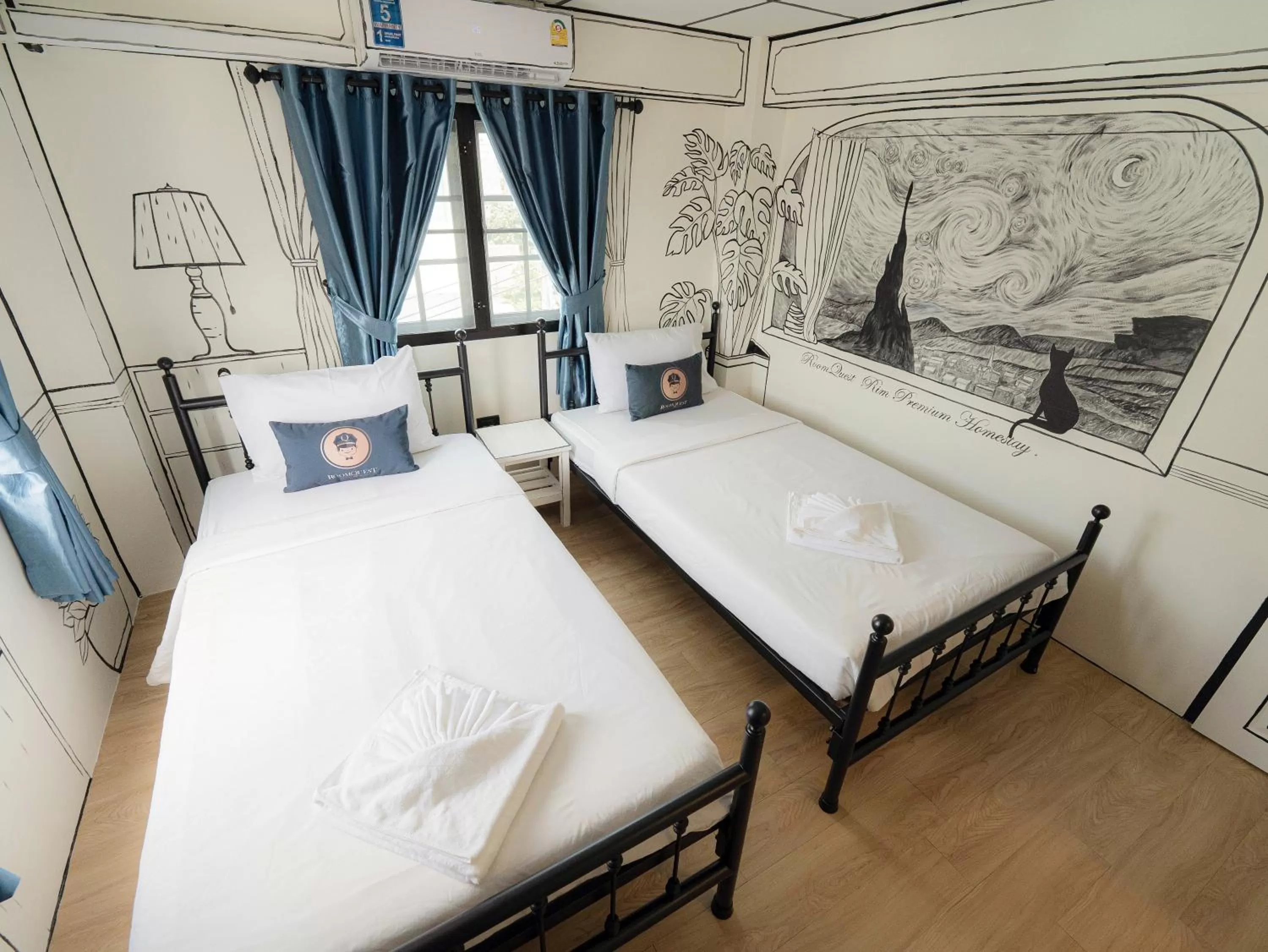 Bed in RoomQuest Chiang Mai Tha Phae