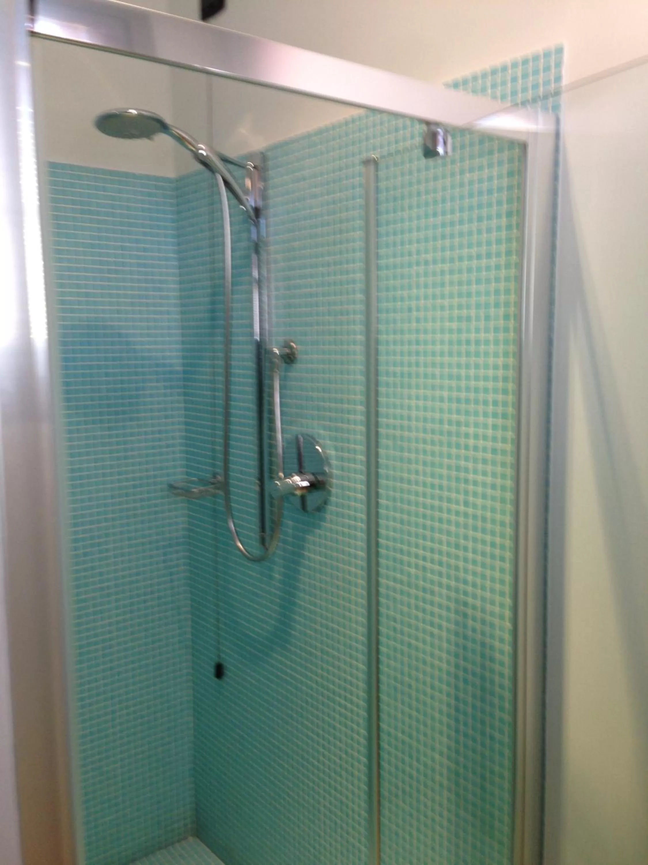 Shower in Joia Hotel & Luxury Apartments RTA
