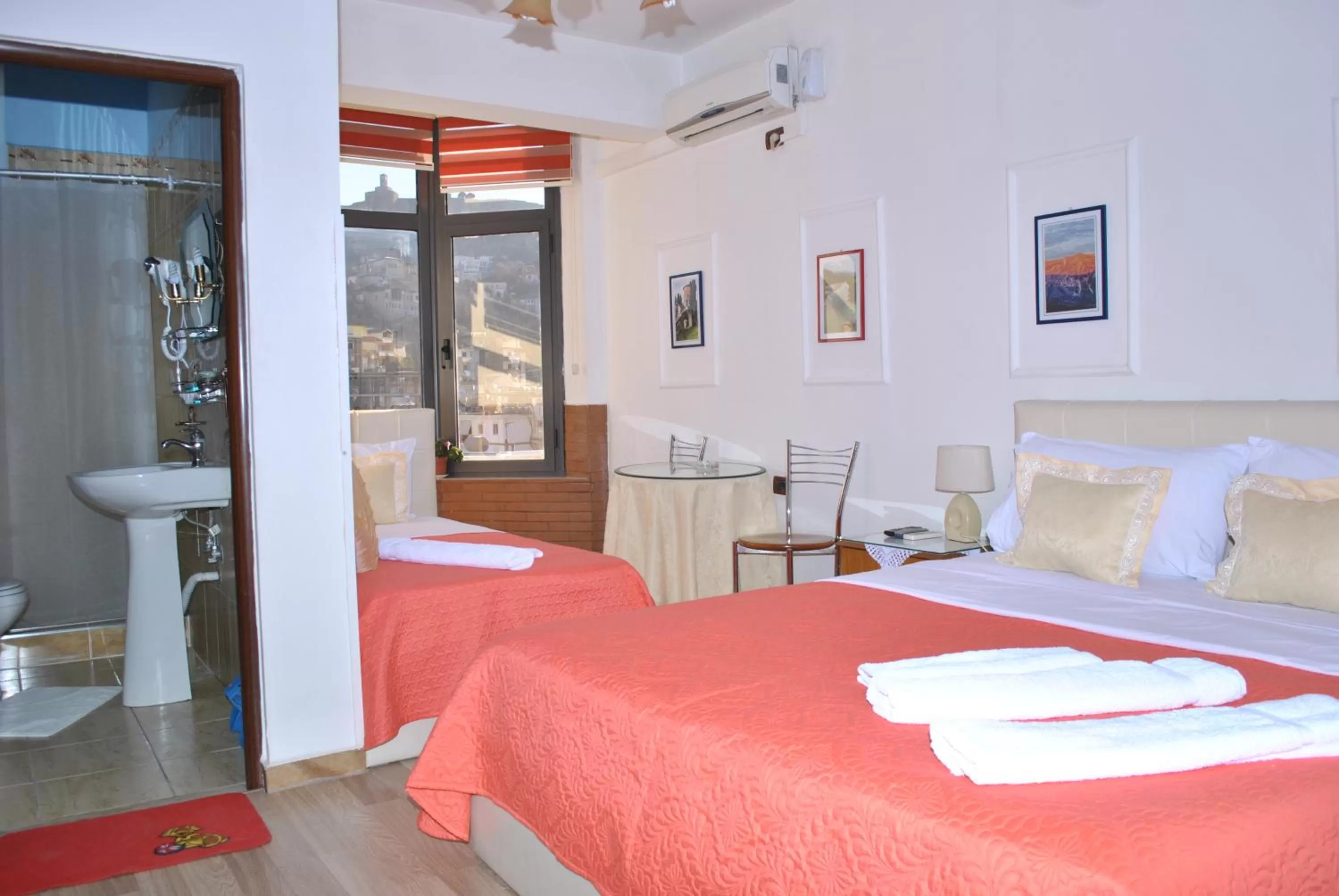 Bathroom, Bed in Hotel The First