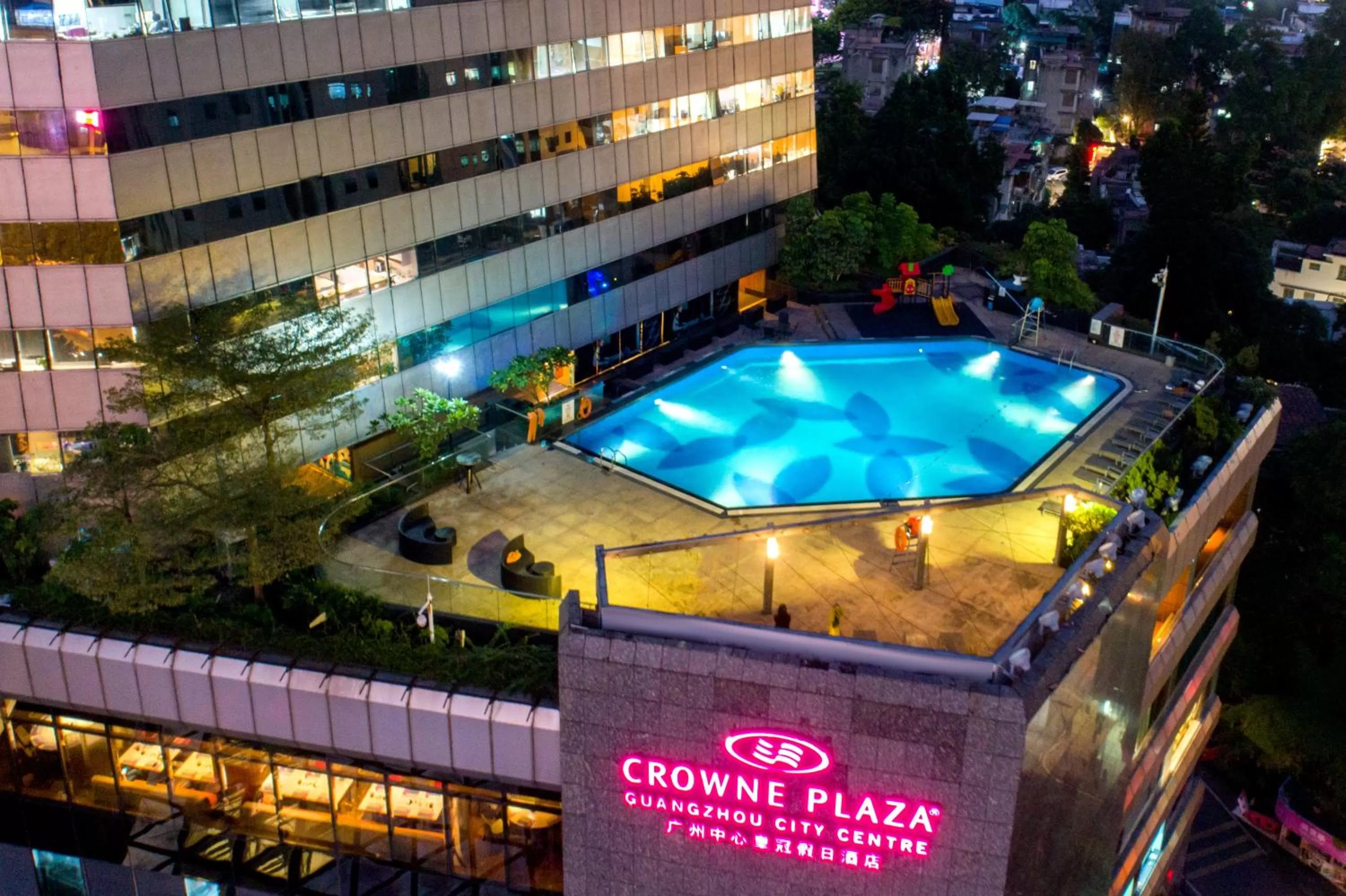 Swimming pool in Crowne Plaza Guangzhou City Centre by IHG